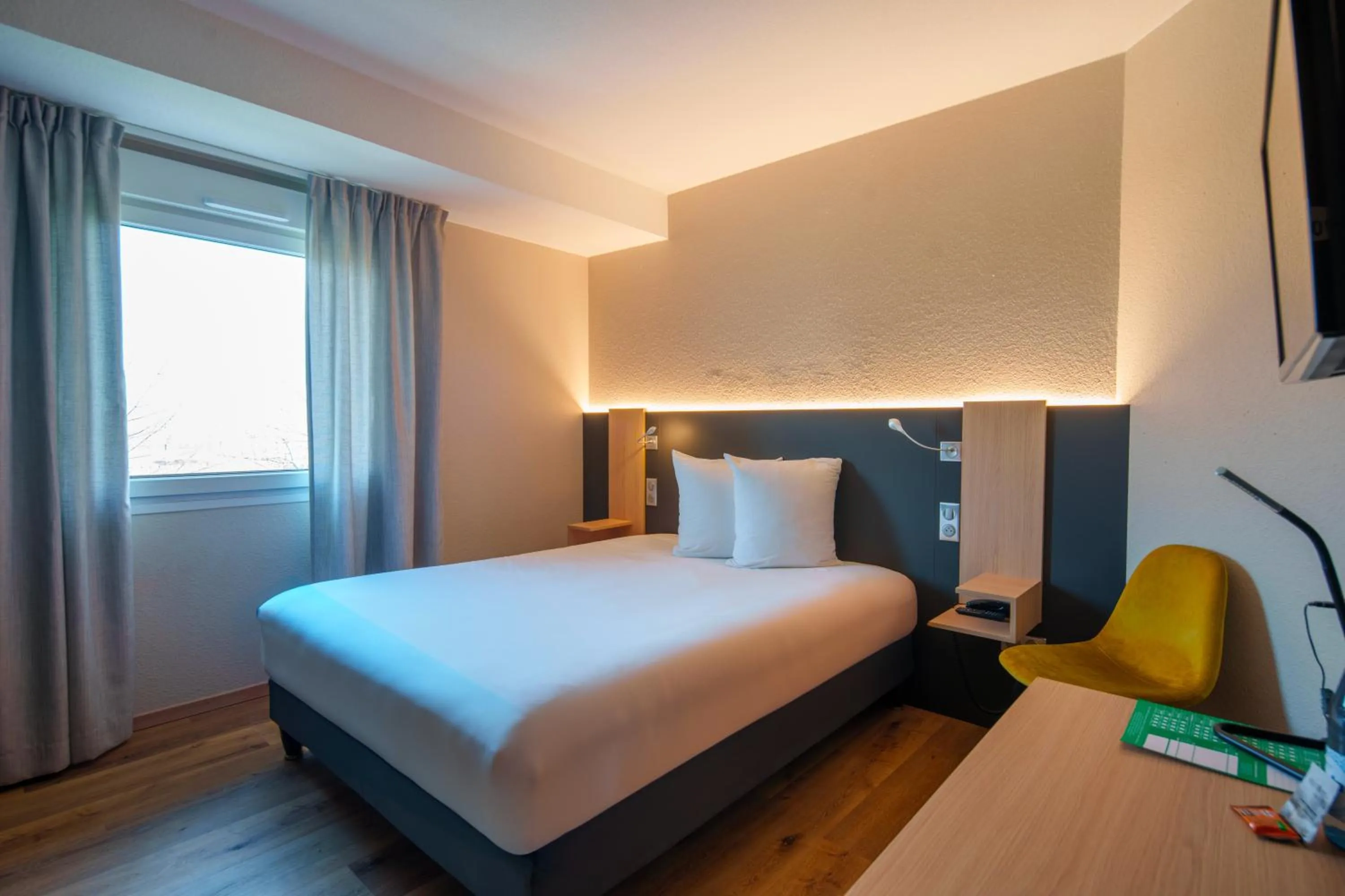 Bed in Logis Hôtel Restaurant Ritter'Hoft