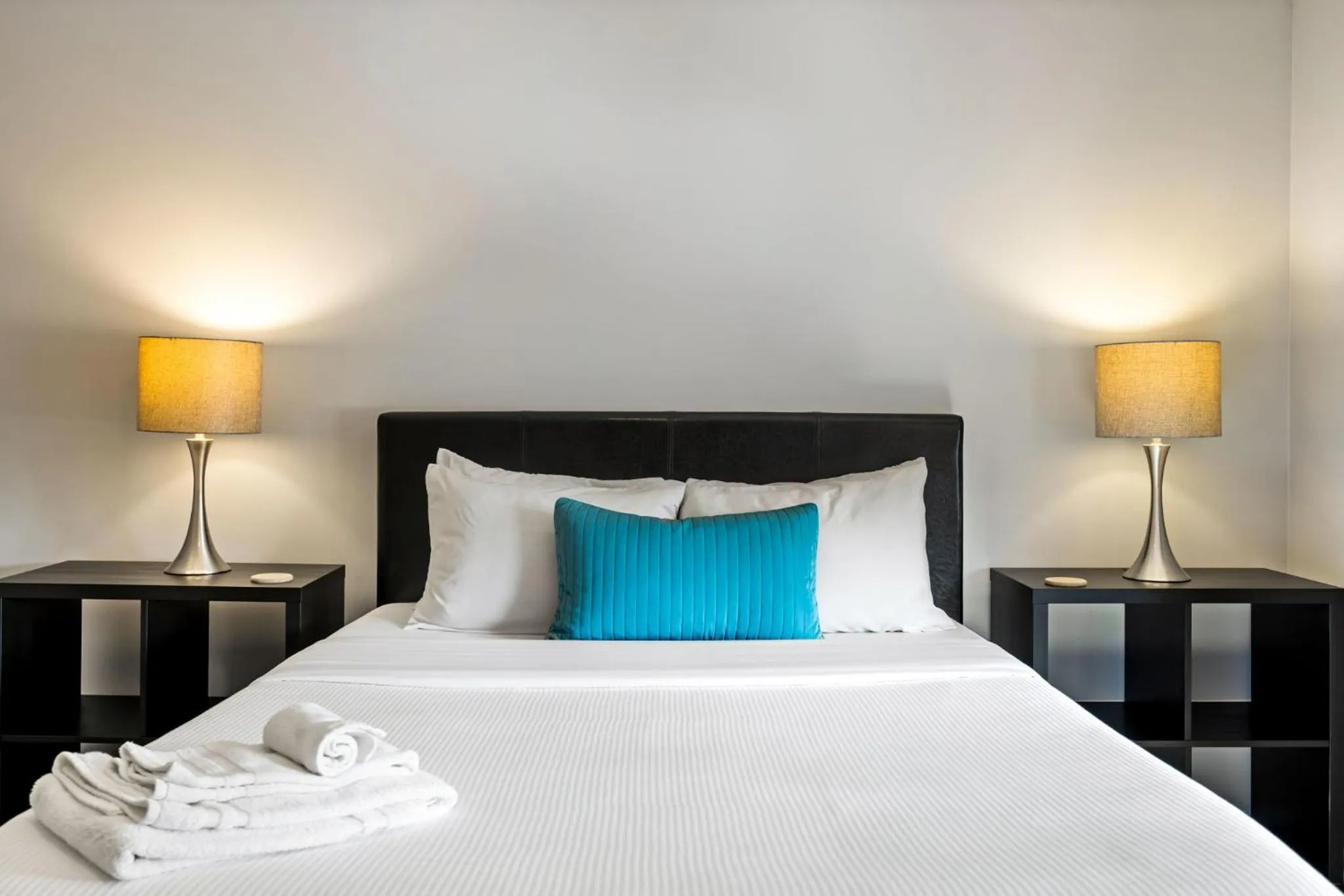 Bed in Brookwood Courtyard by BCA Furnished Apartments