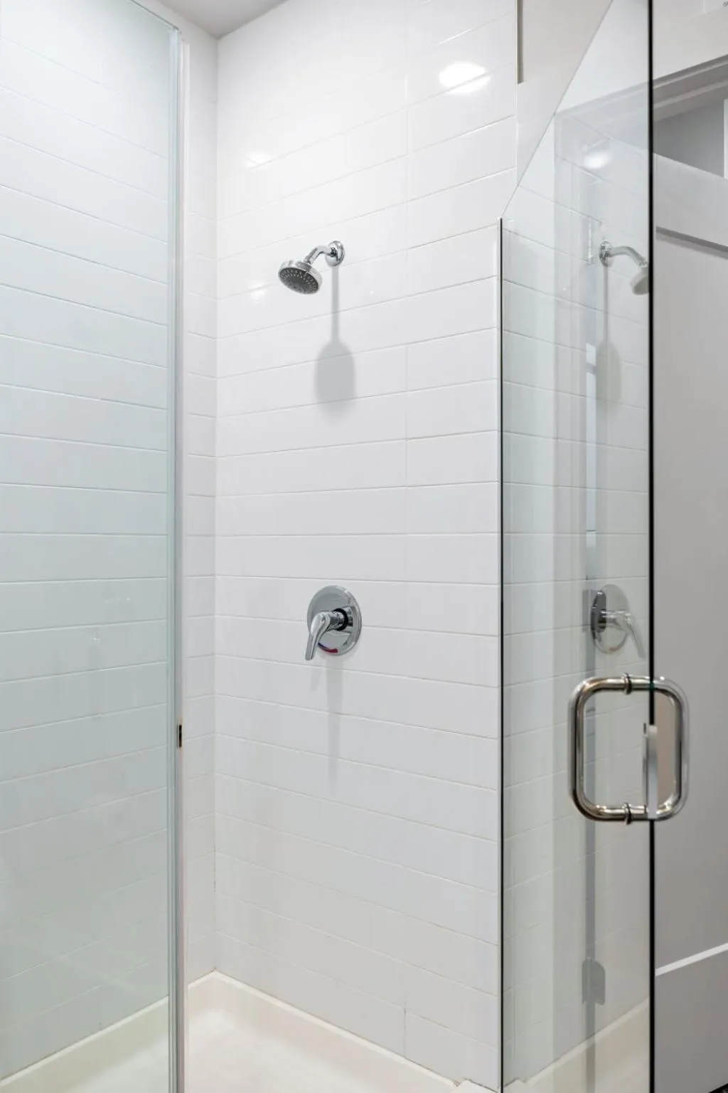 Shower in Spectacular Apartments by BCA Furnished Apartments