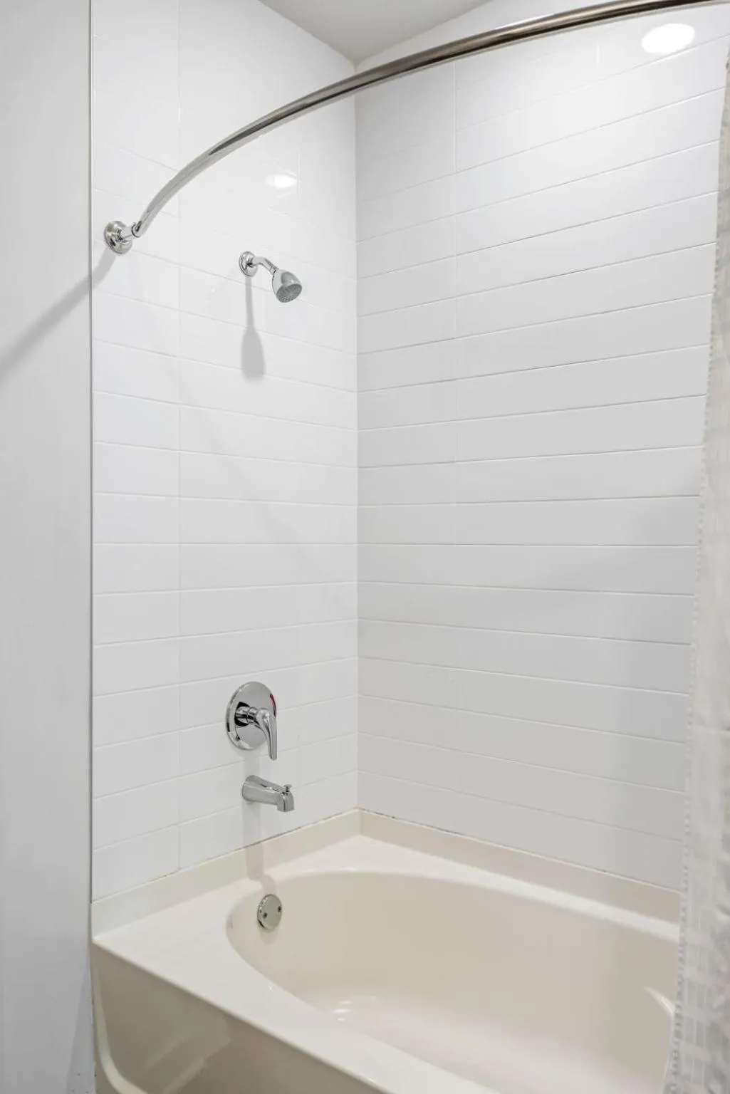 Shower in Spectacular Apartments by BCA Furnished Apartments