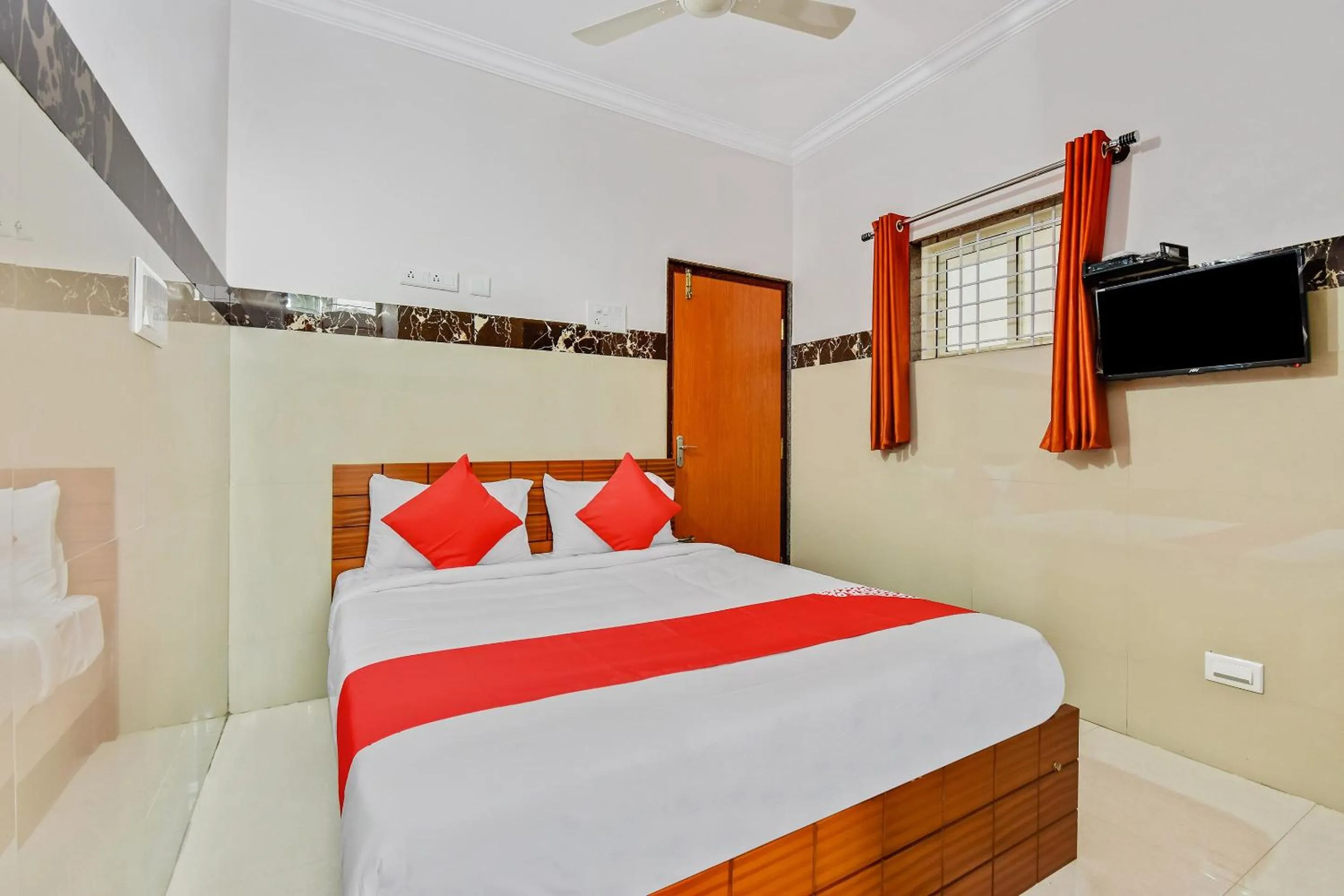 Bedroom, Bed in Hotel O Sri Sai Guru Comforts