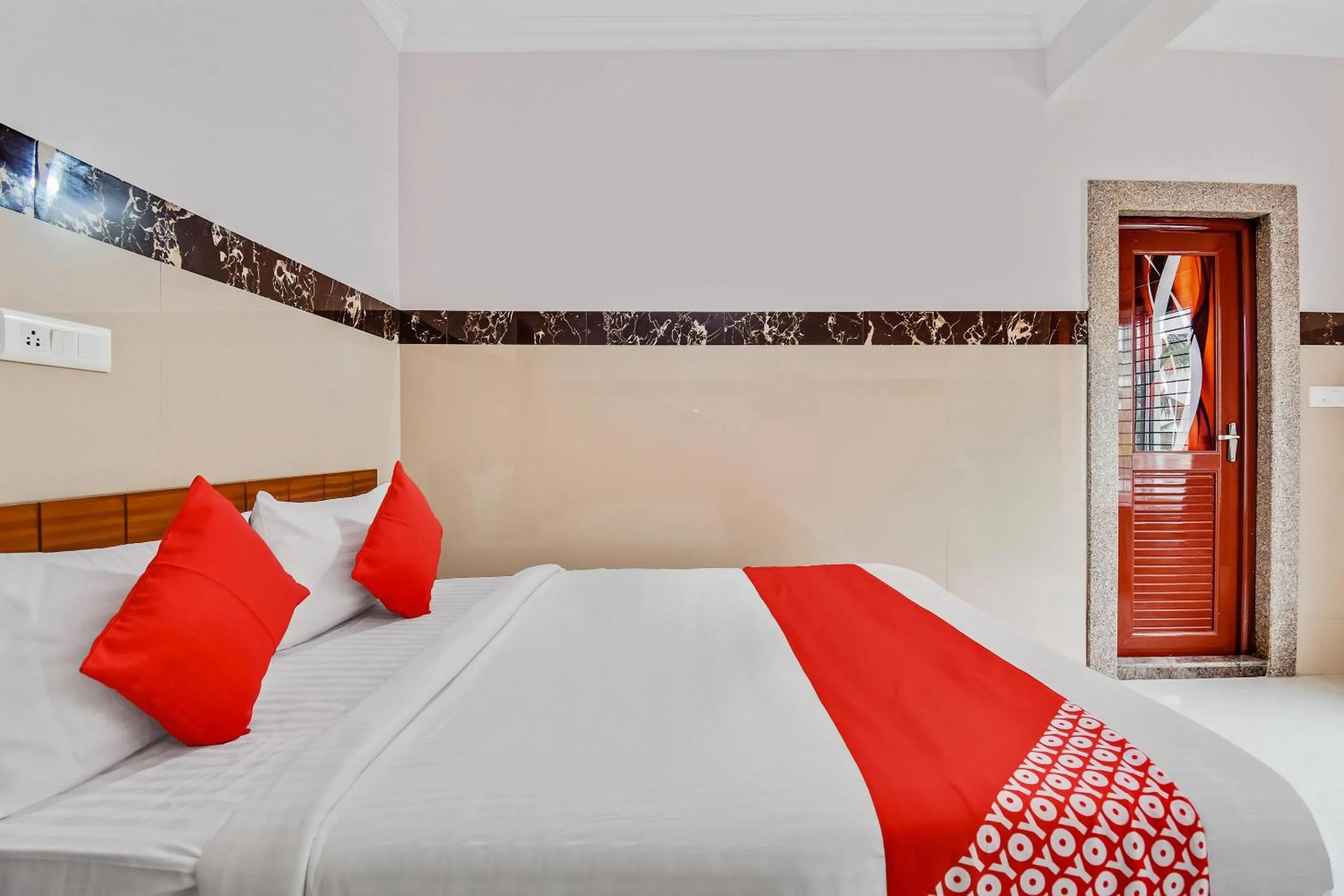 Bedroom, Bed in Hotel O Sri Sai Guru Comforts