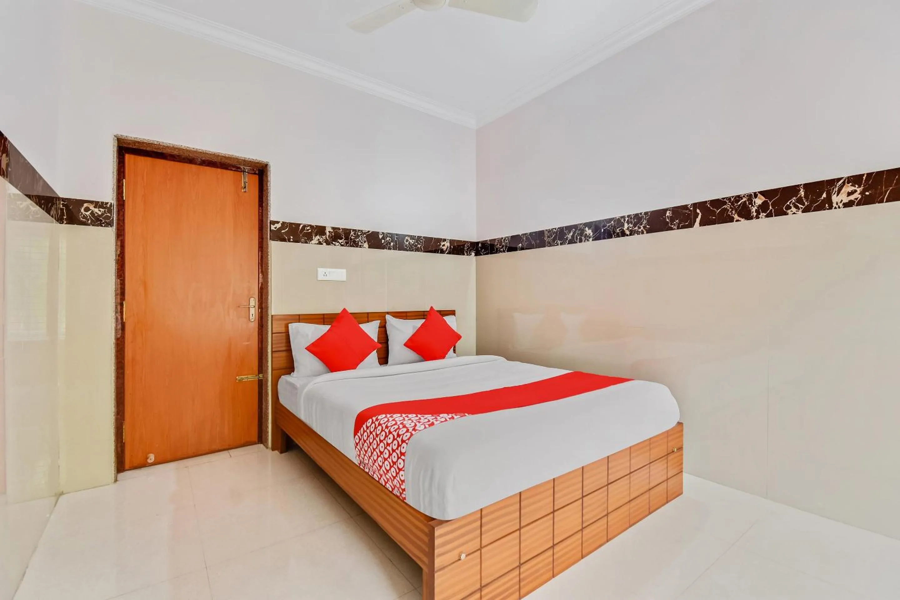 Bedroom, Bed in Hotel O Sri Sai Guru Comforts