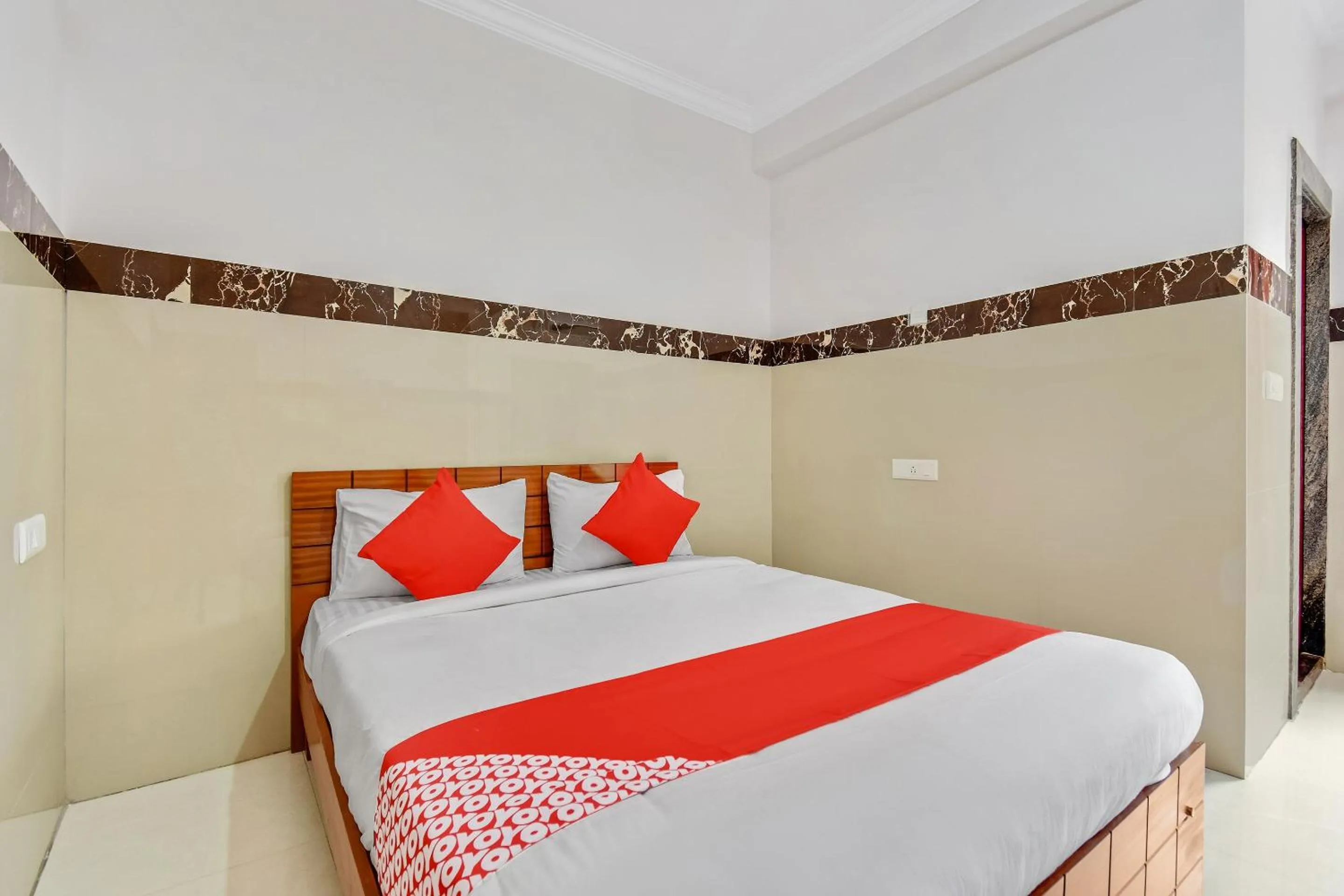 Bedroom, Bed in Hotel O Sri Sai Guru Comforts