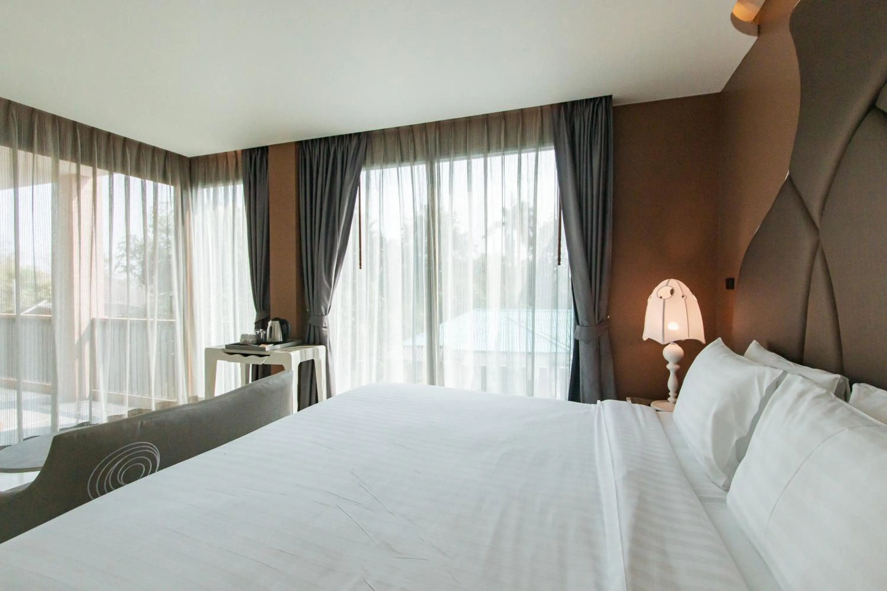 Bed in Rachabhura Hotel