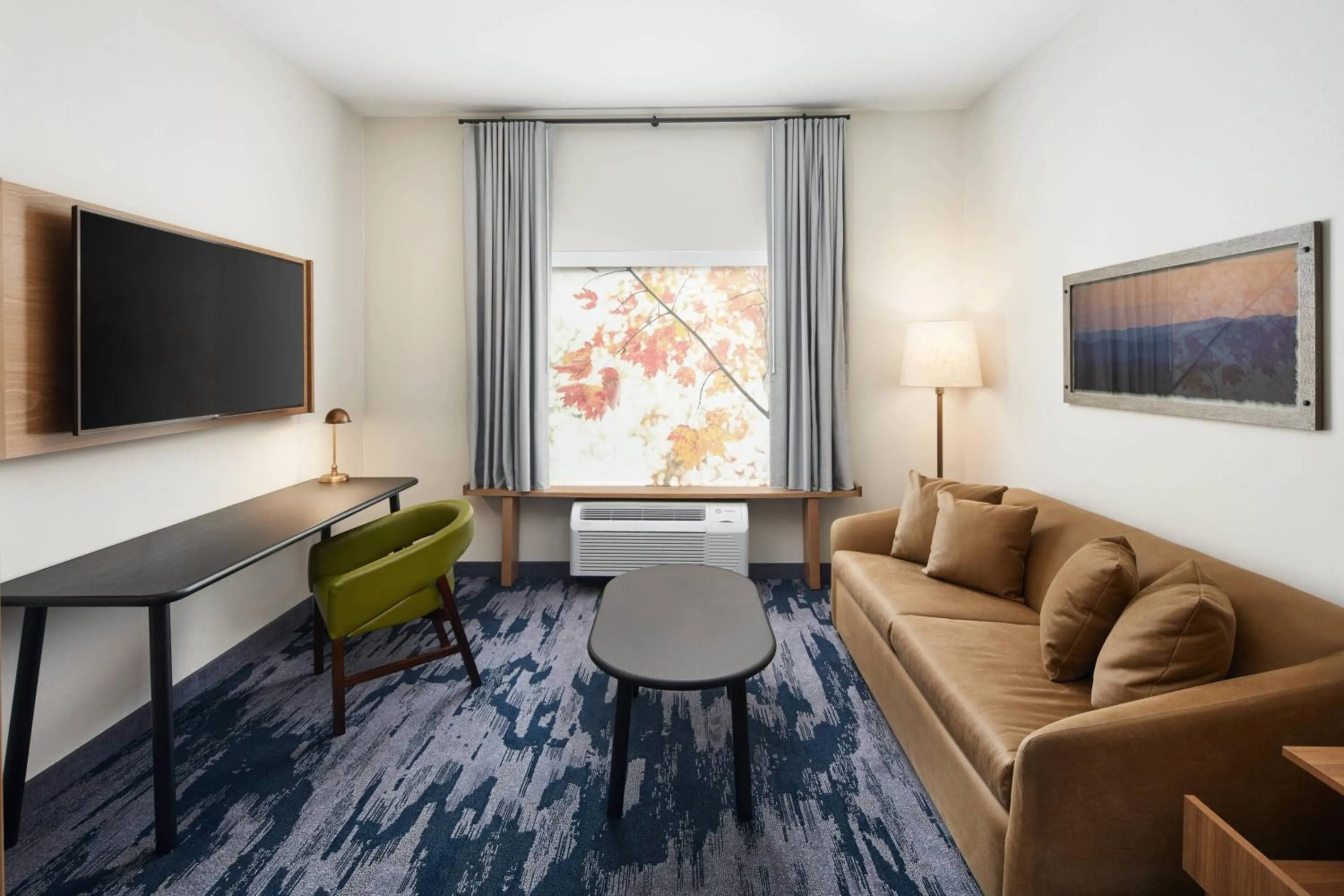 Living room in Fairfield Inn & Suites by Marriott Raleigh Wake Forest