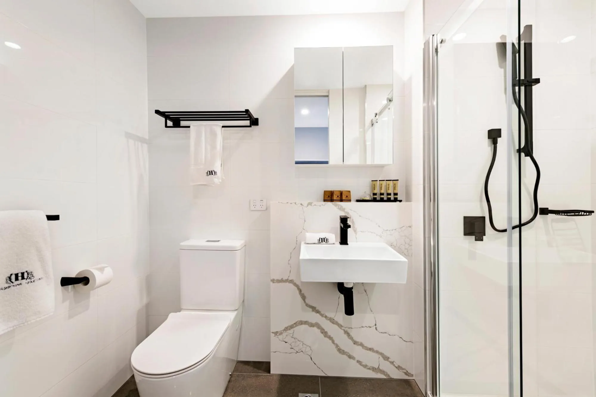 Shower in The Hamptons Apartments - St Kilda