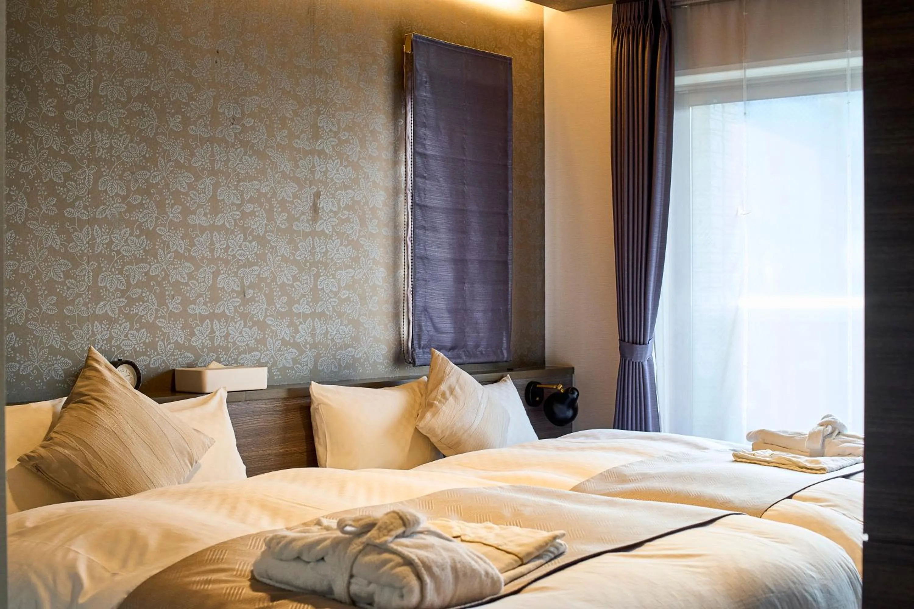 Bed in HOTEL MASTAY jingumichi