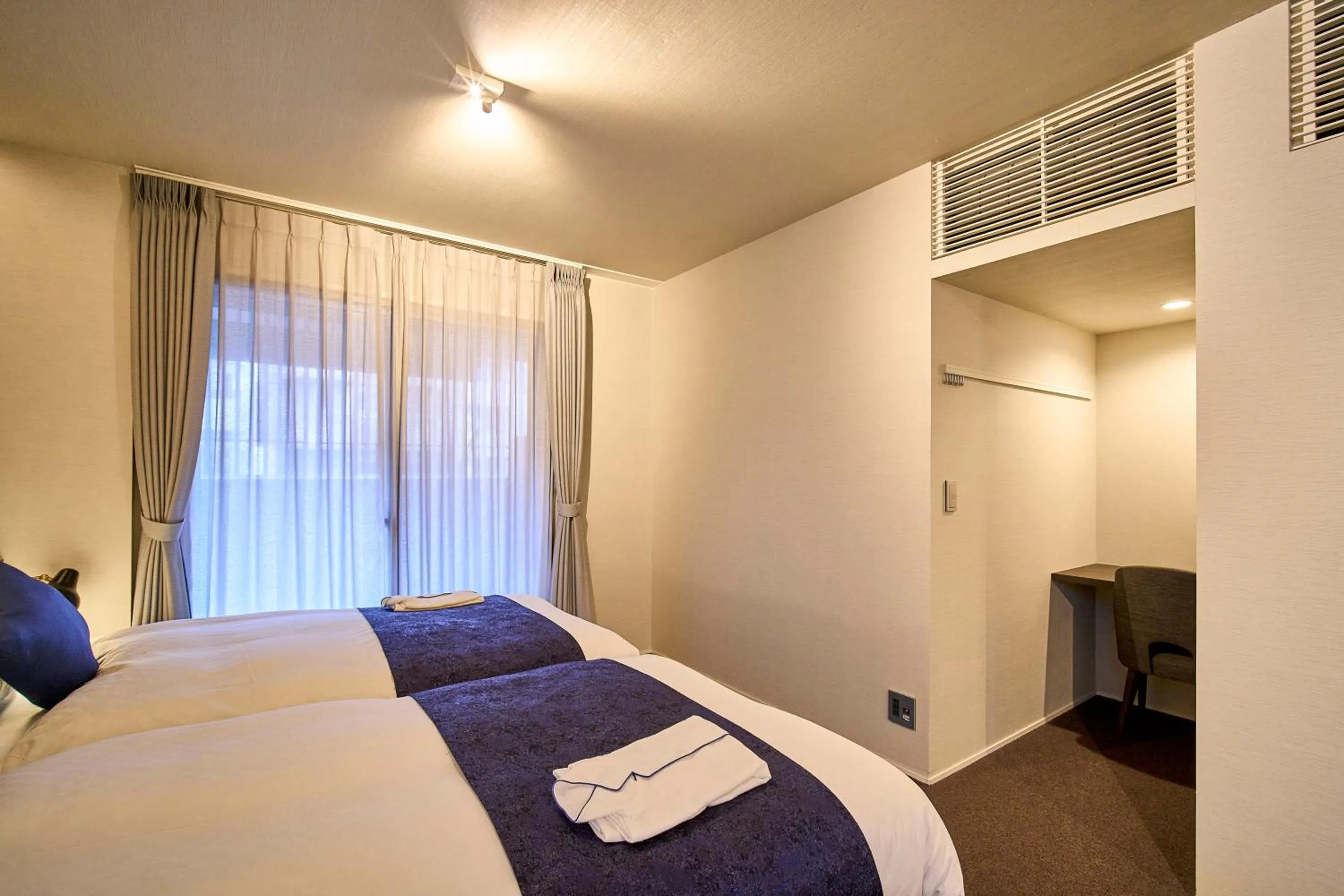 Bed in HOTEL MASTAY jingumichi