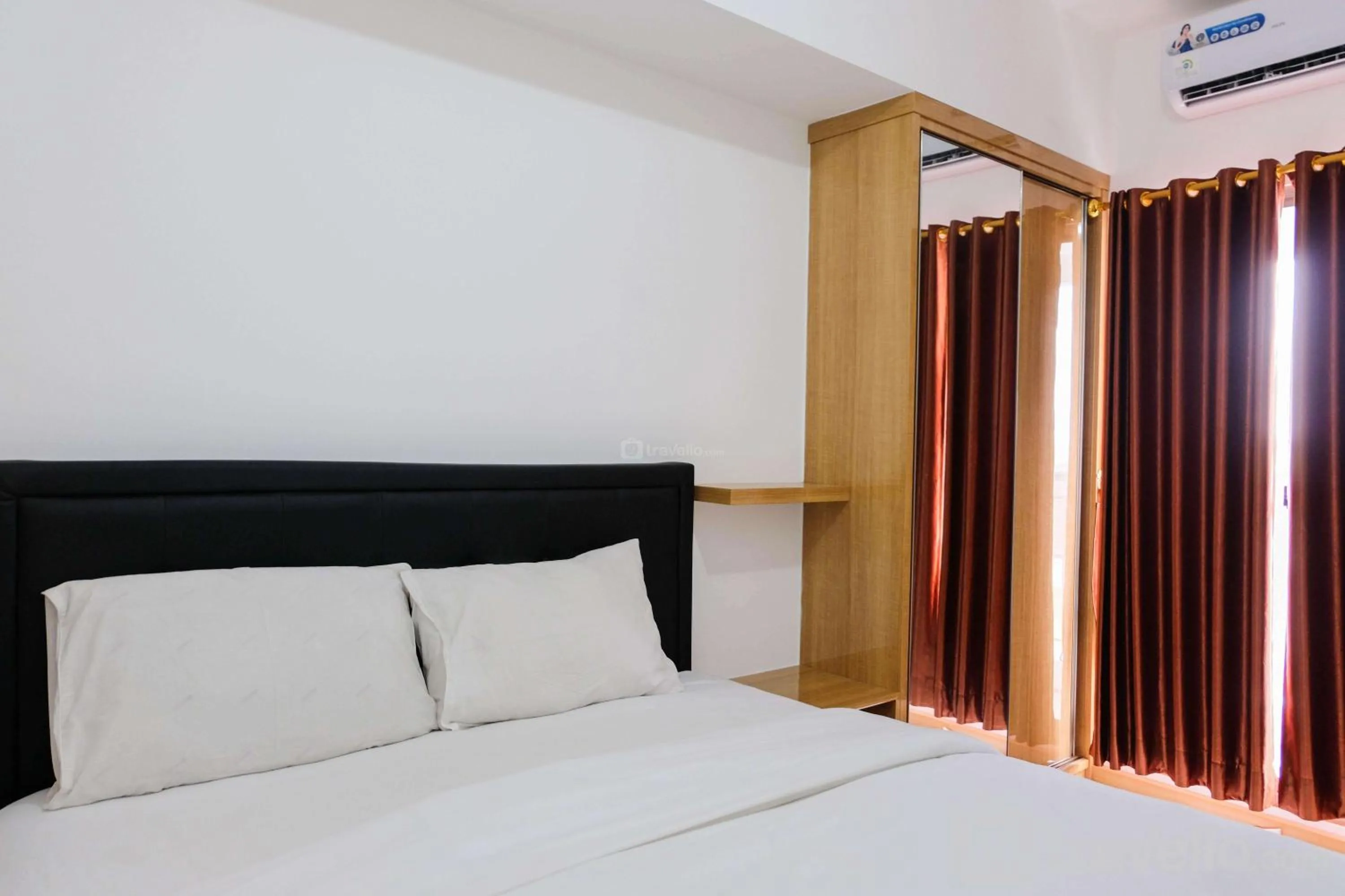 Bed in Comfortable 2BR Apartment at M-Town Residence By Travelio