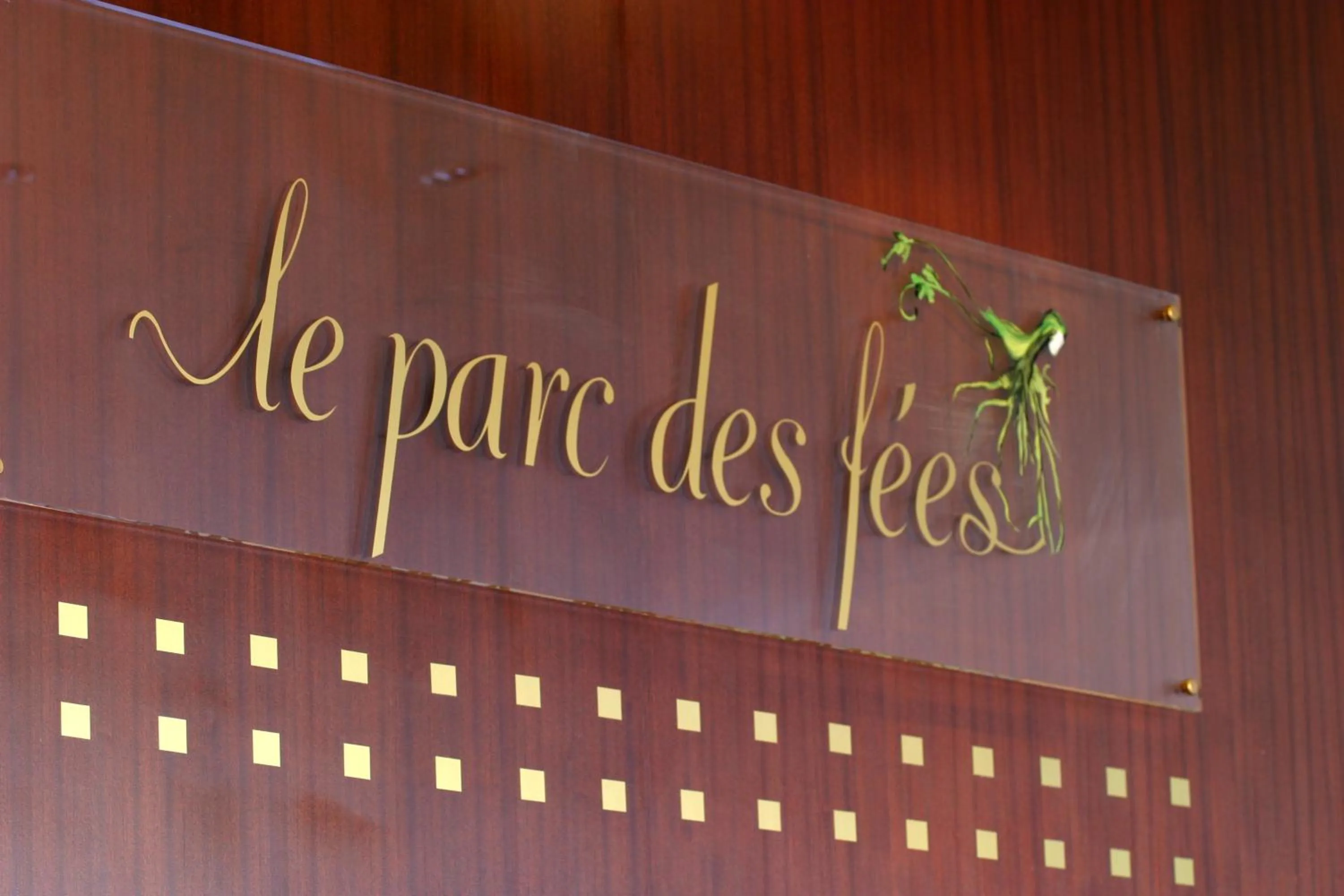 Decorative detail, Property Logo/Sign in Le Parc Des Fees Hôtel Retaurant & Spa