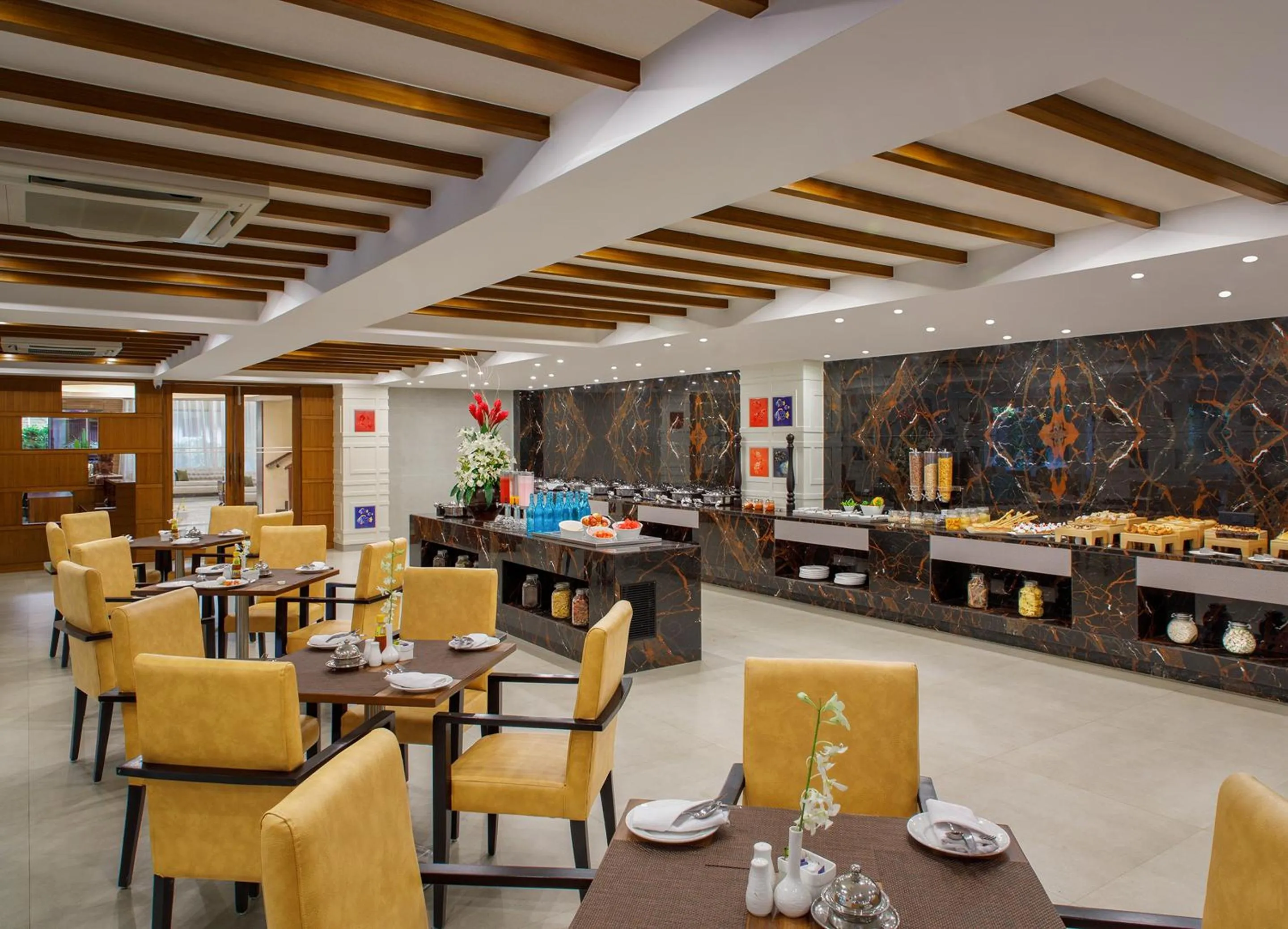 Restaurant/places to eat in Sobit Sarovar Portico