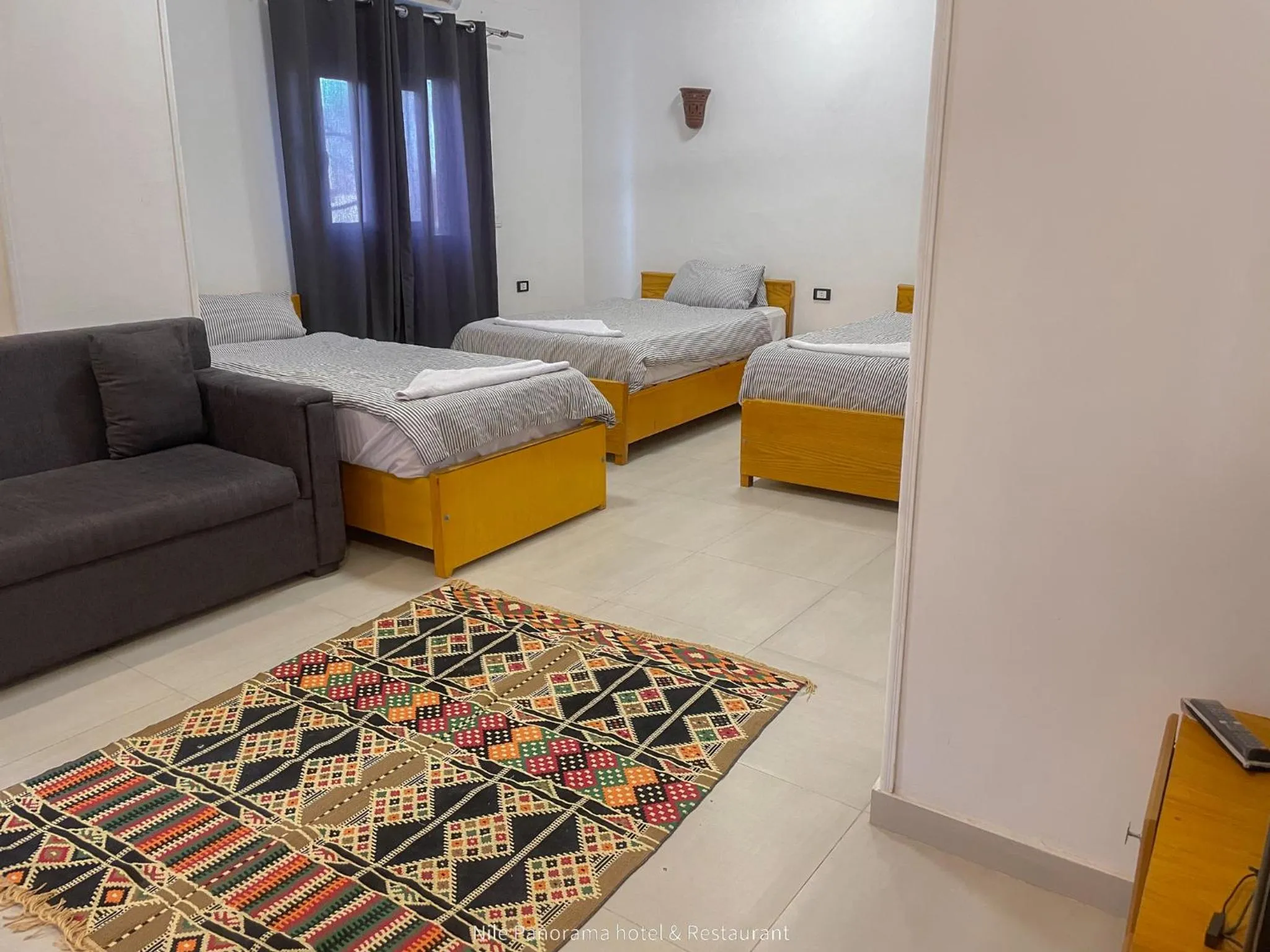 Photo of the whole room, Bed in Nile Panorama Hotel & Restaurant