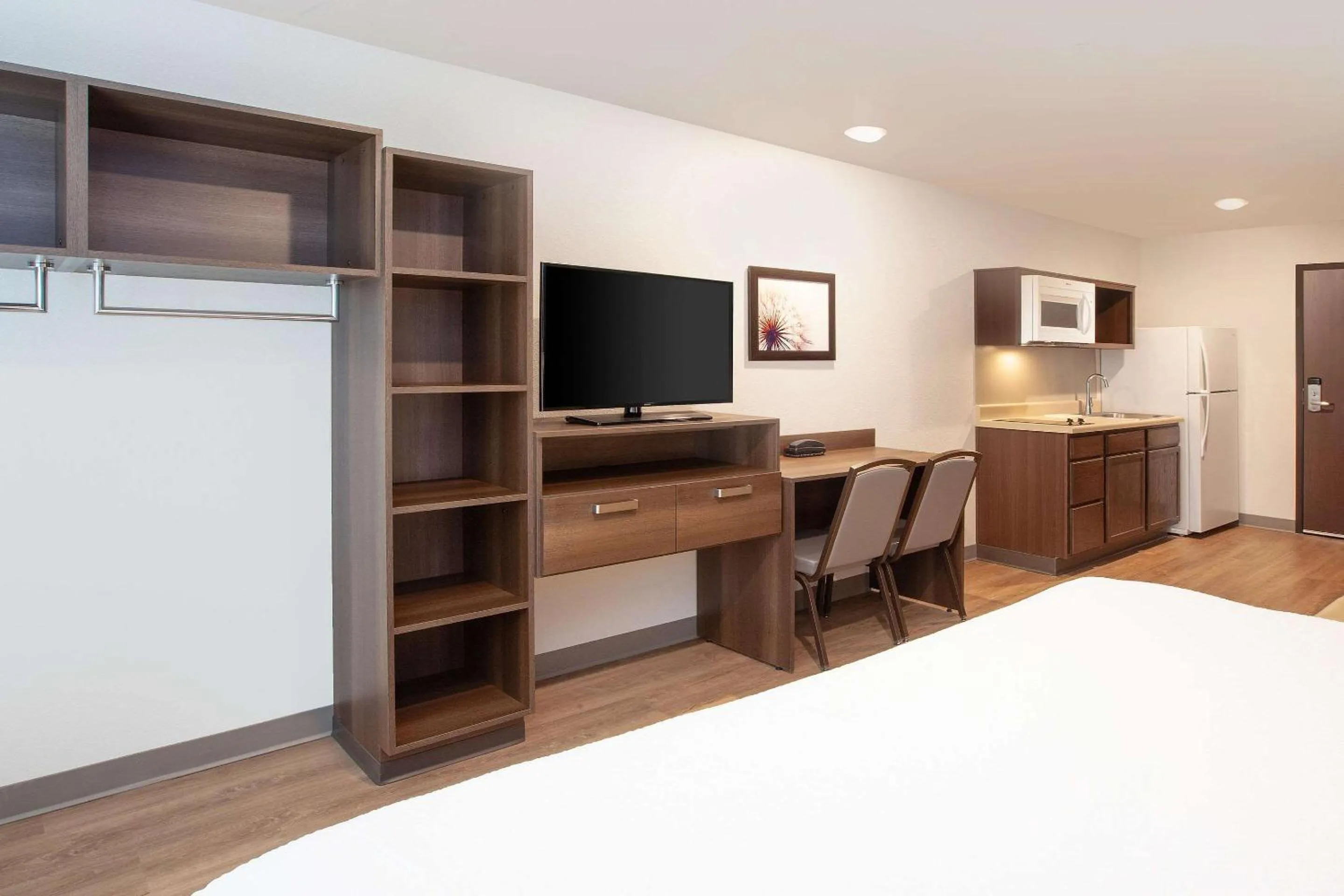 Photo of the whole room, Bed in WoodSpring Suites Quantico