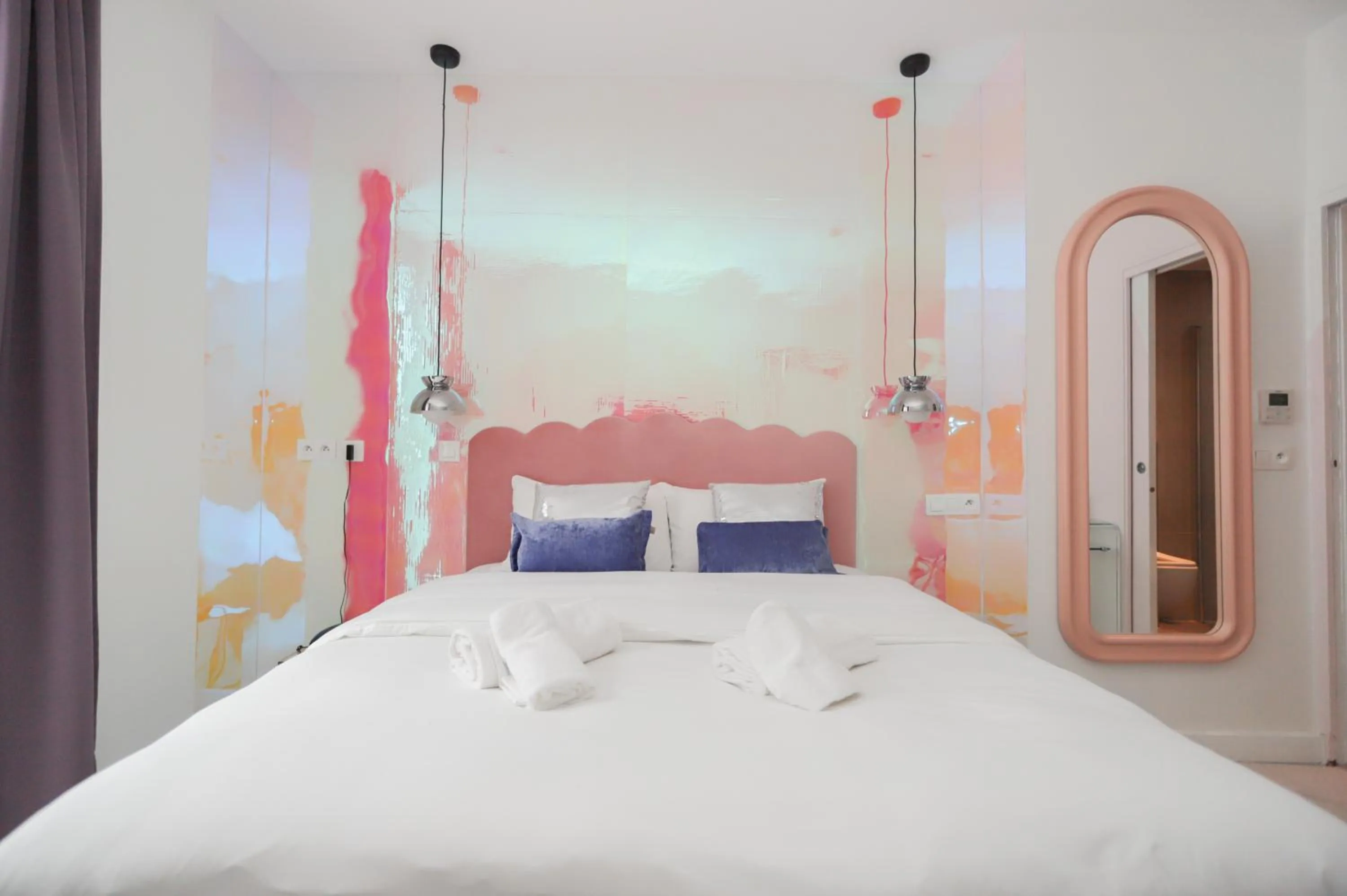 Bed in Le Glam's Hotel