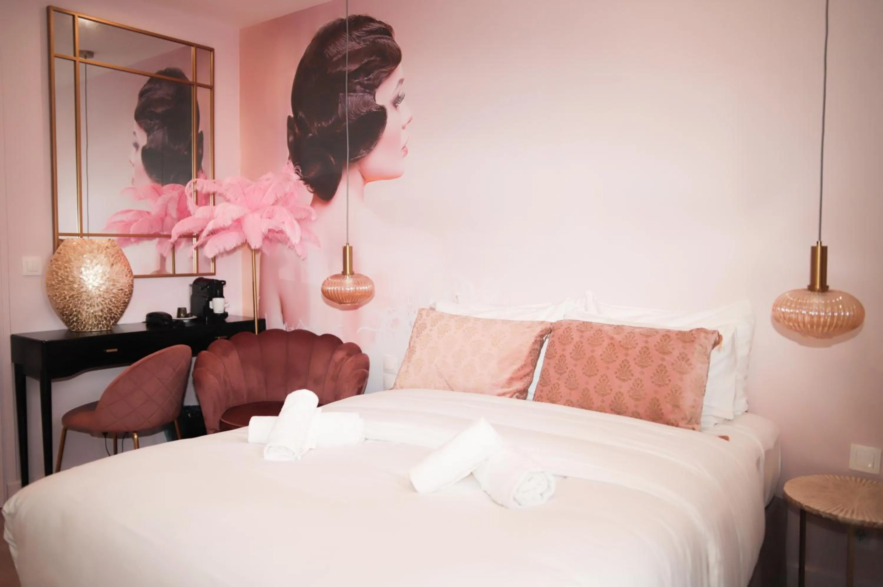 Bed in Le Glam's Hotel