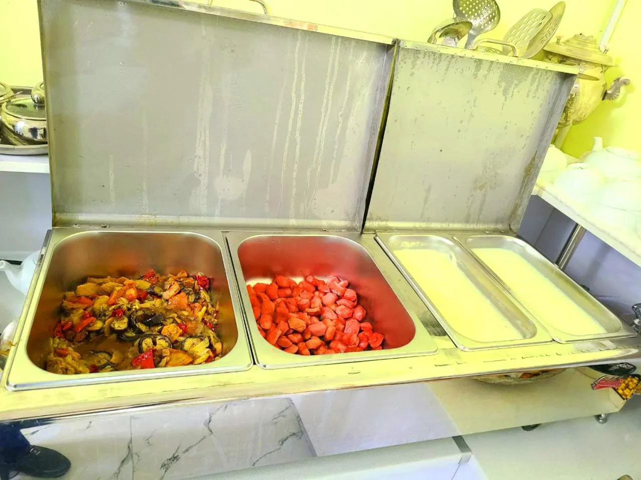 Kitchen or kitchenette in Samarkand City Center Hotel