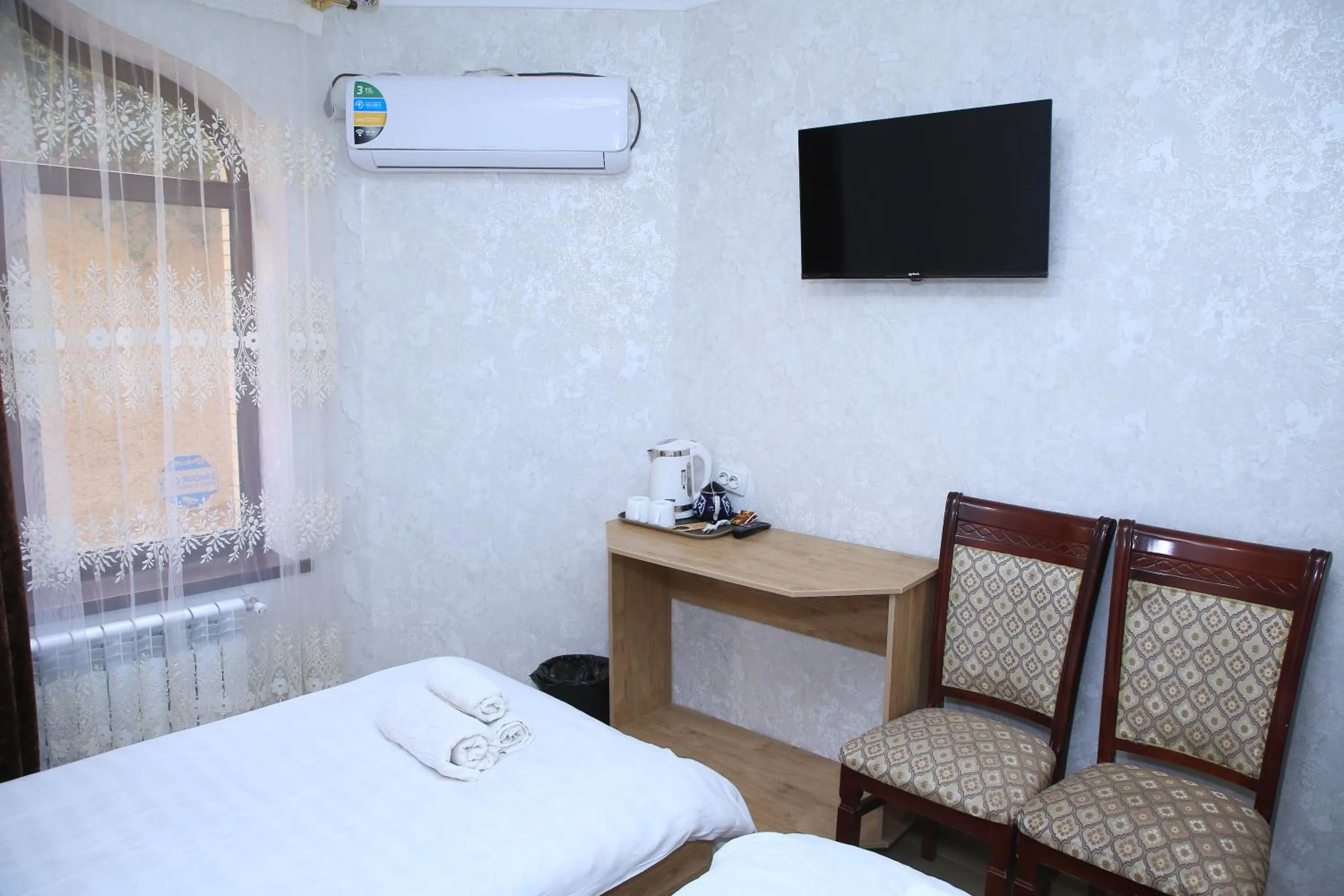 Bed in Samarkand City Center Hotel