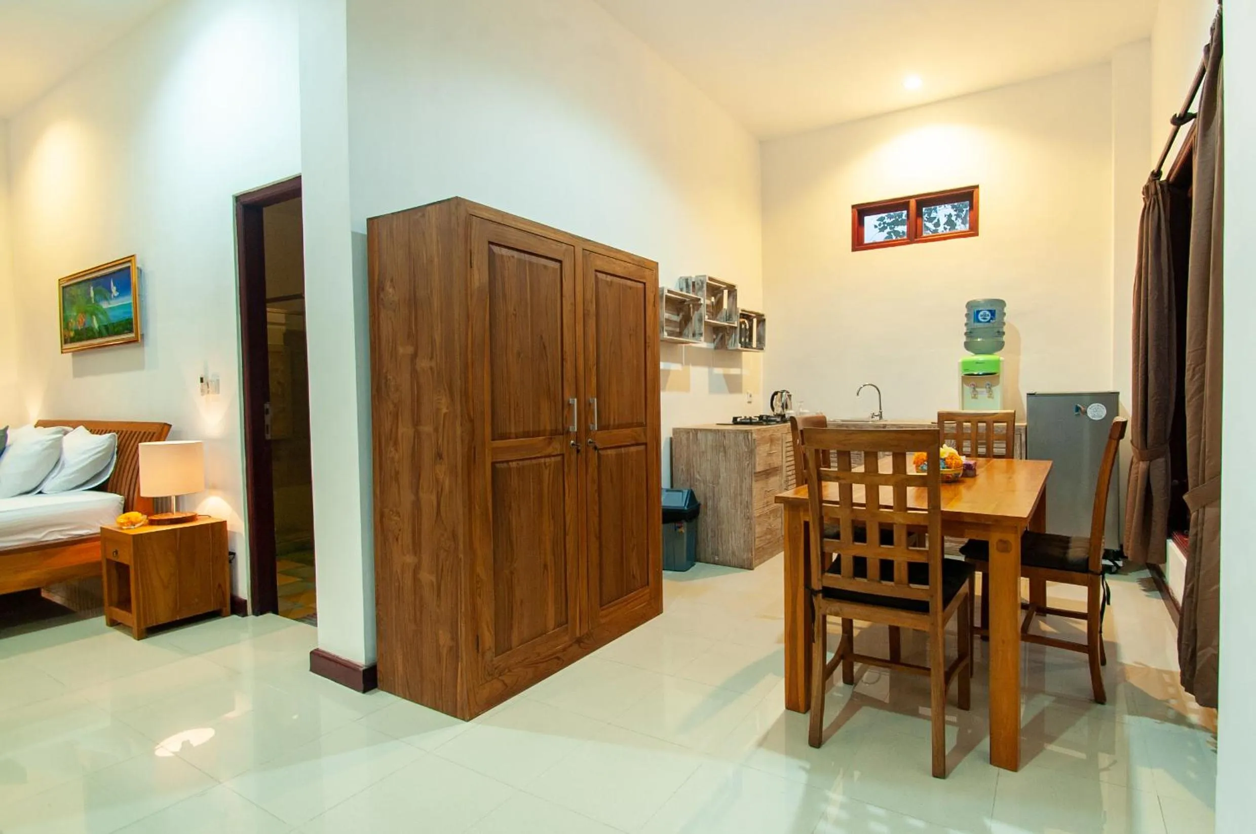 Kitchen or kitchenette, Bed in Flamboyant Villa Ubud