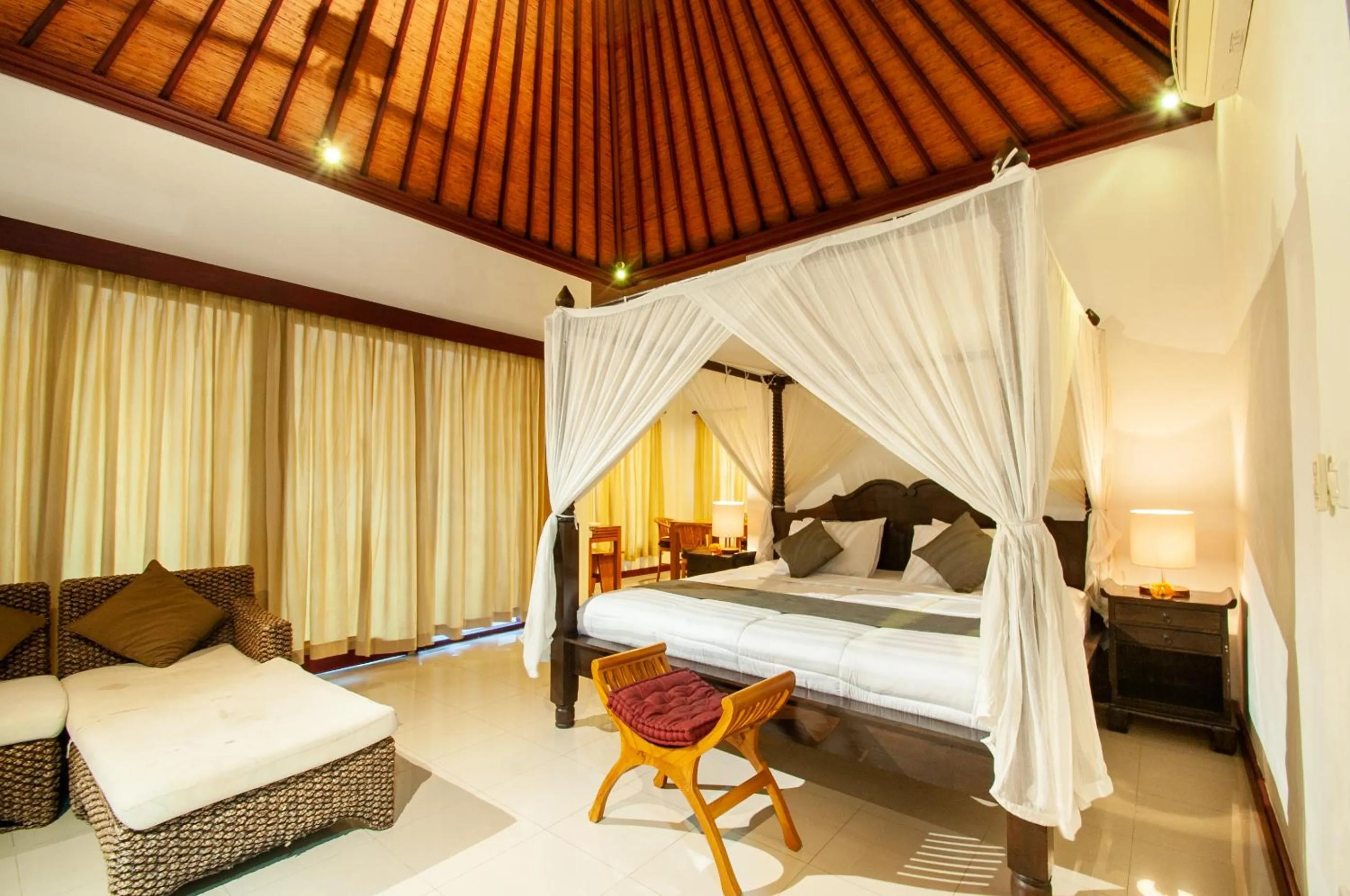 Bed in Flamboyant Villa Ubud
