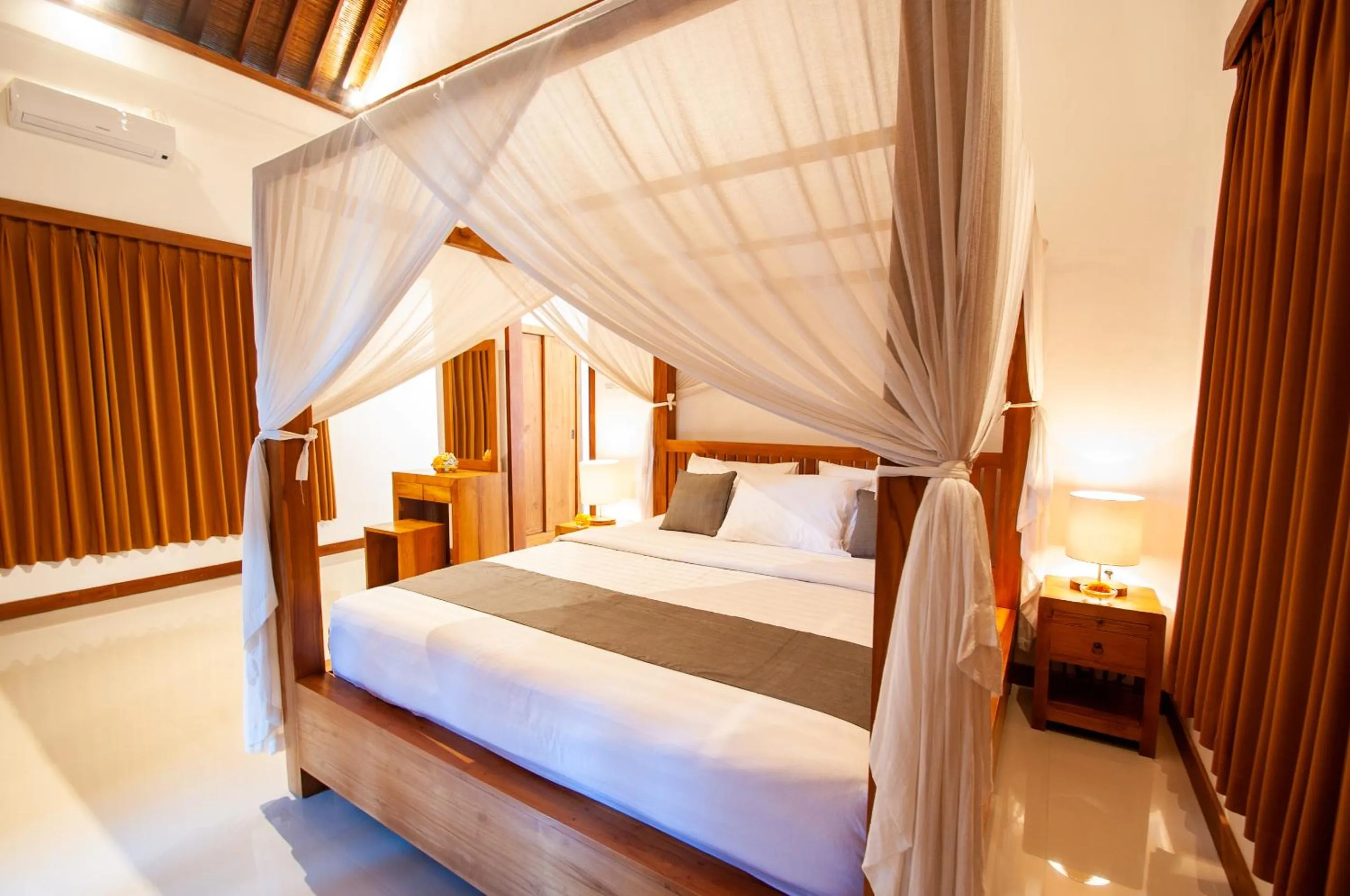 Bed in Flamboyant Villa Ubud