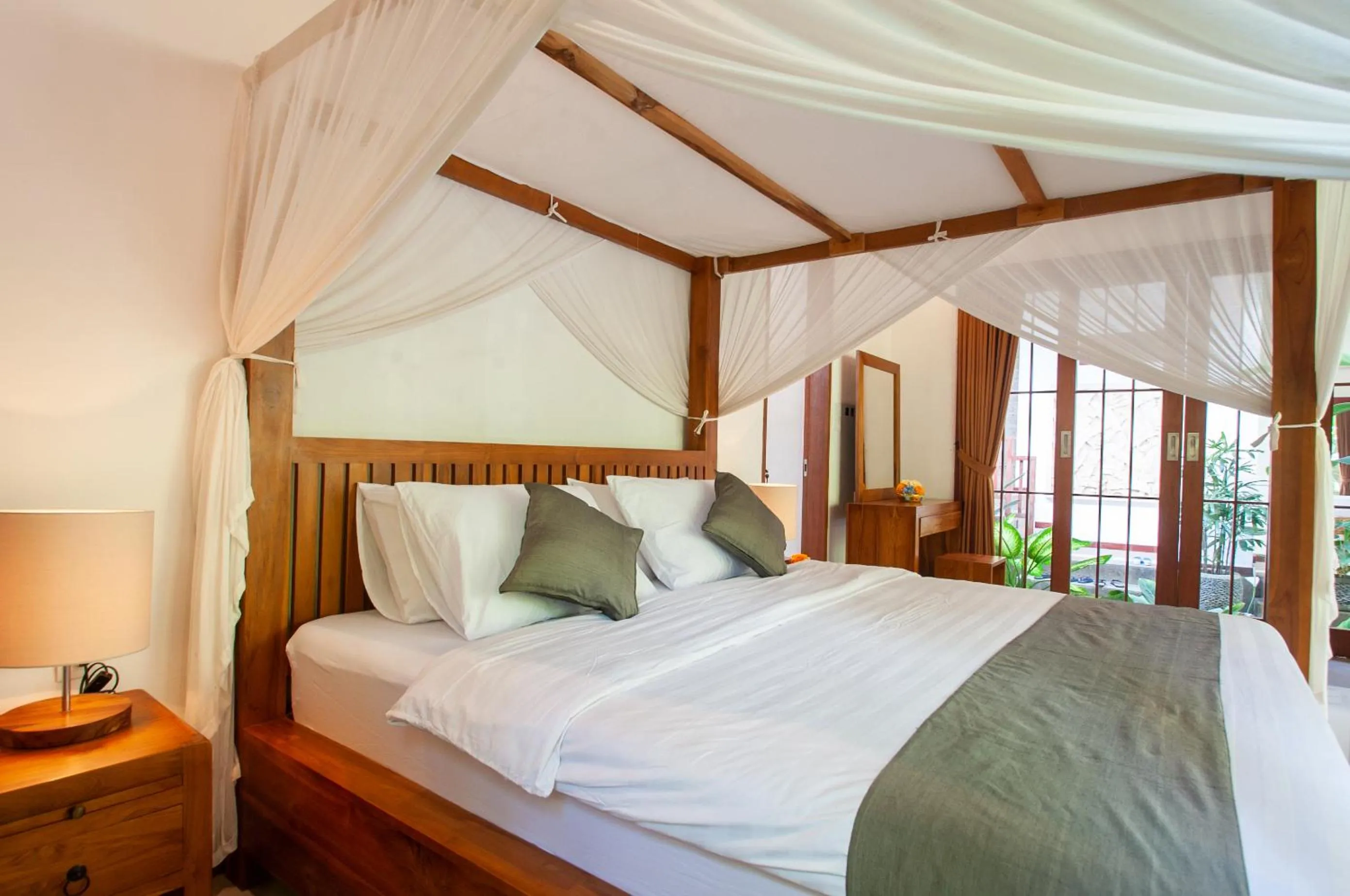 Bed in Flamboyant Villa Ubud