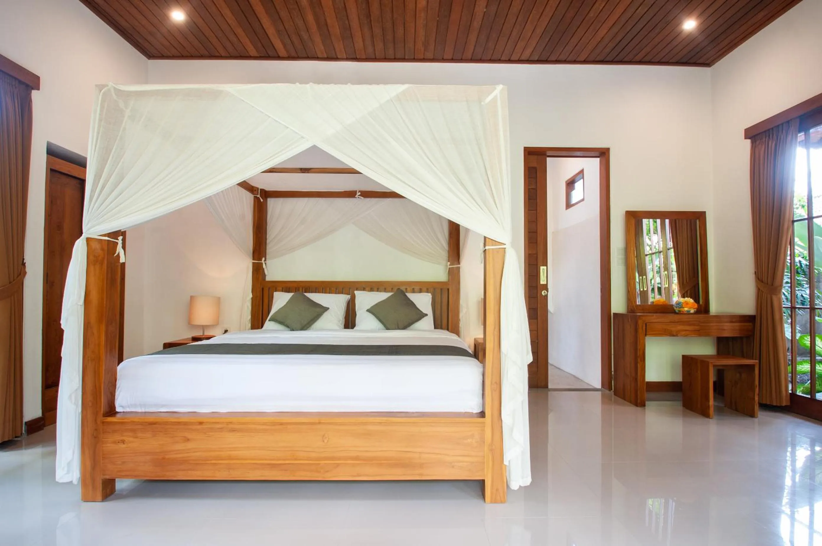 Bed in Flamboyant Villa Ubud
