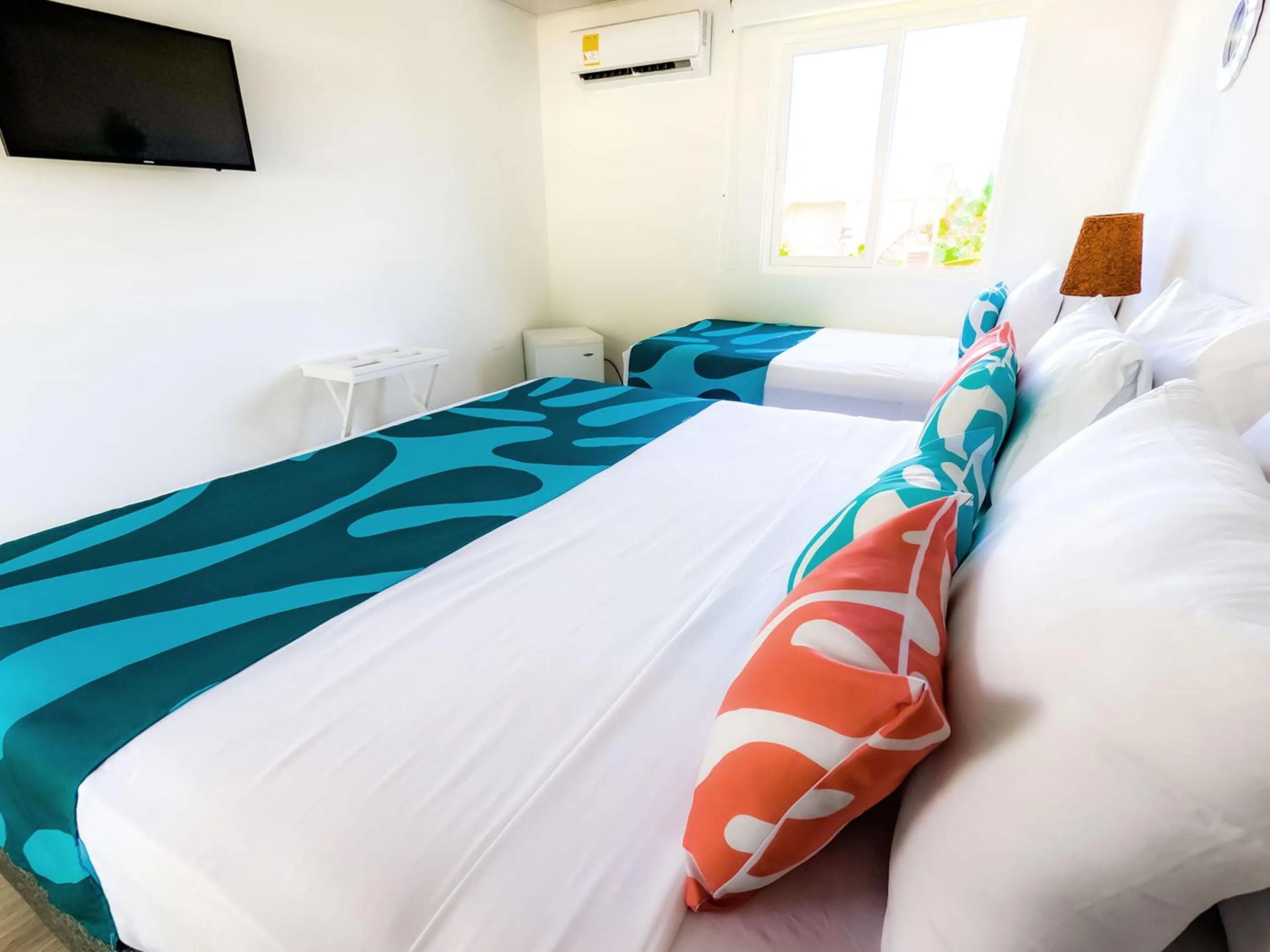 Bed in Hotel Caribbean Coral