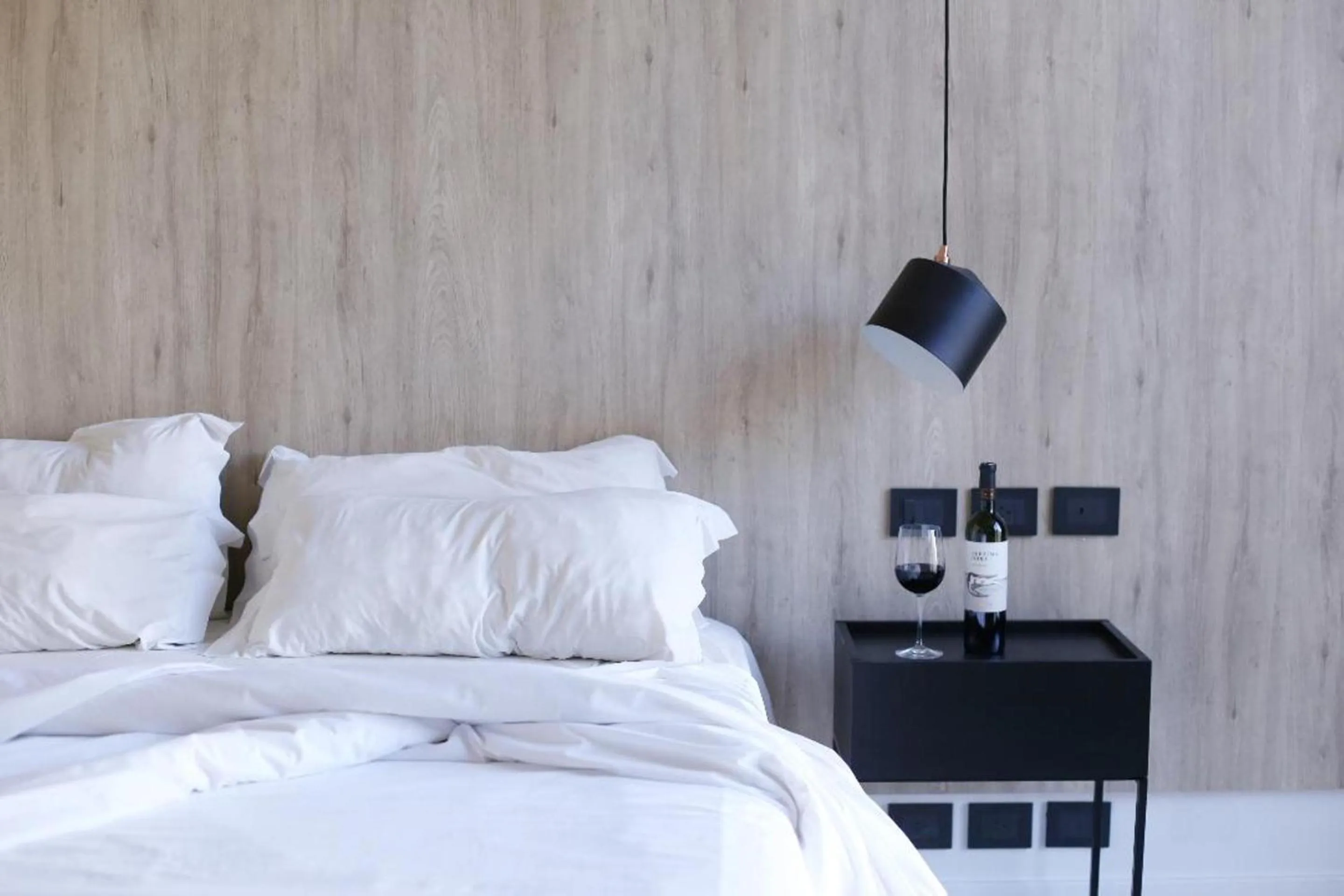 Bed in Krista Boutique Hotel