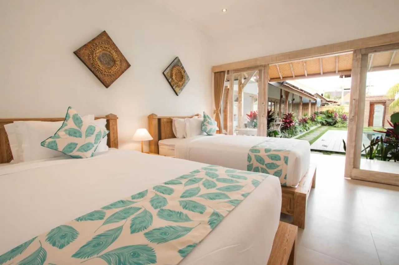Bed in Devan Guest House Canggu