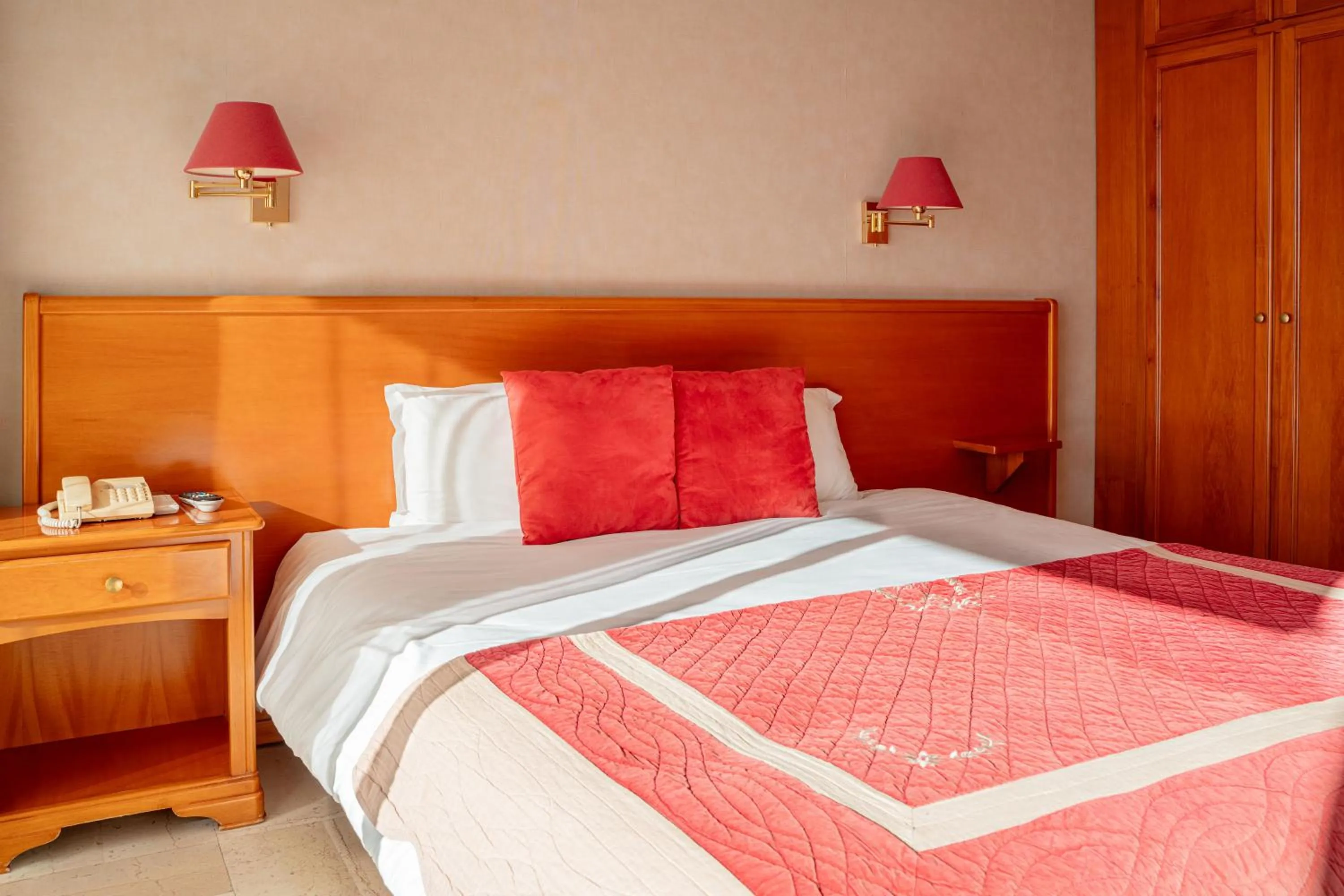 Bed in Logis Hotel Diana