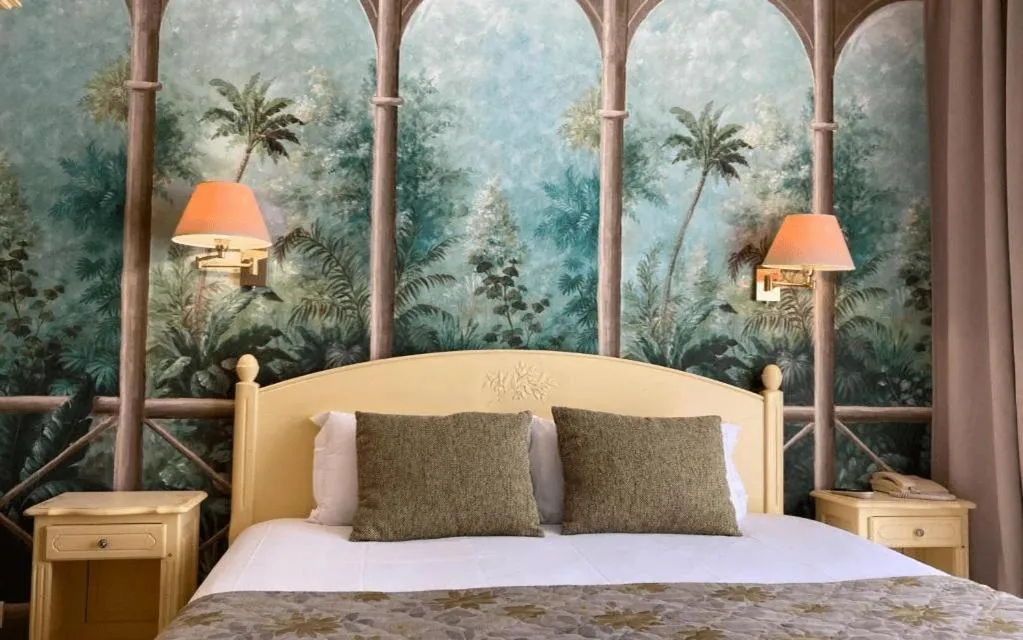 Bed in Logis Hotel Diana