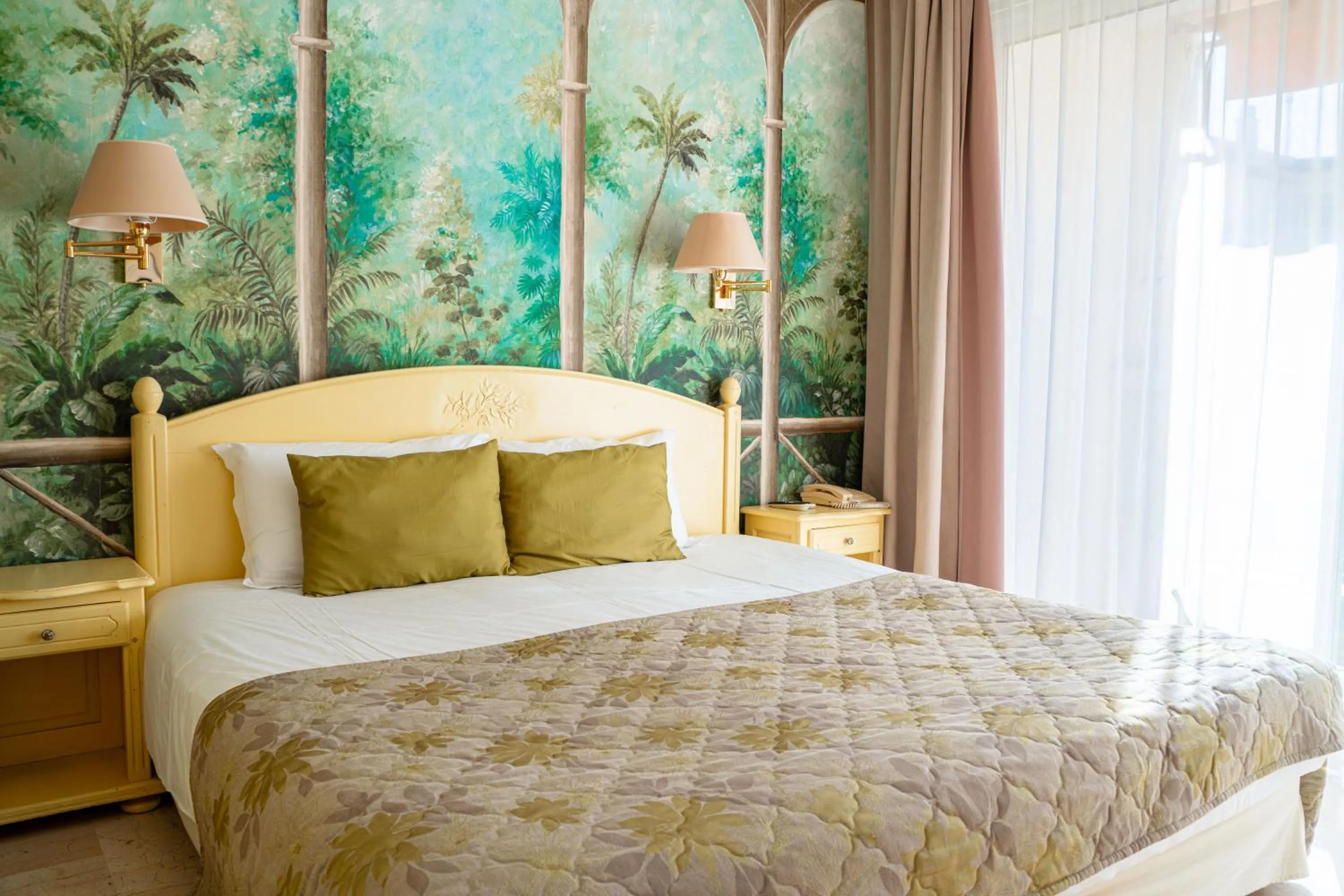 Bed in Logis Hotel Diana