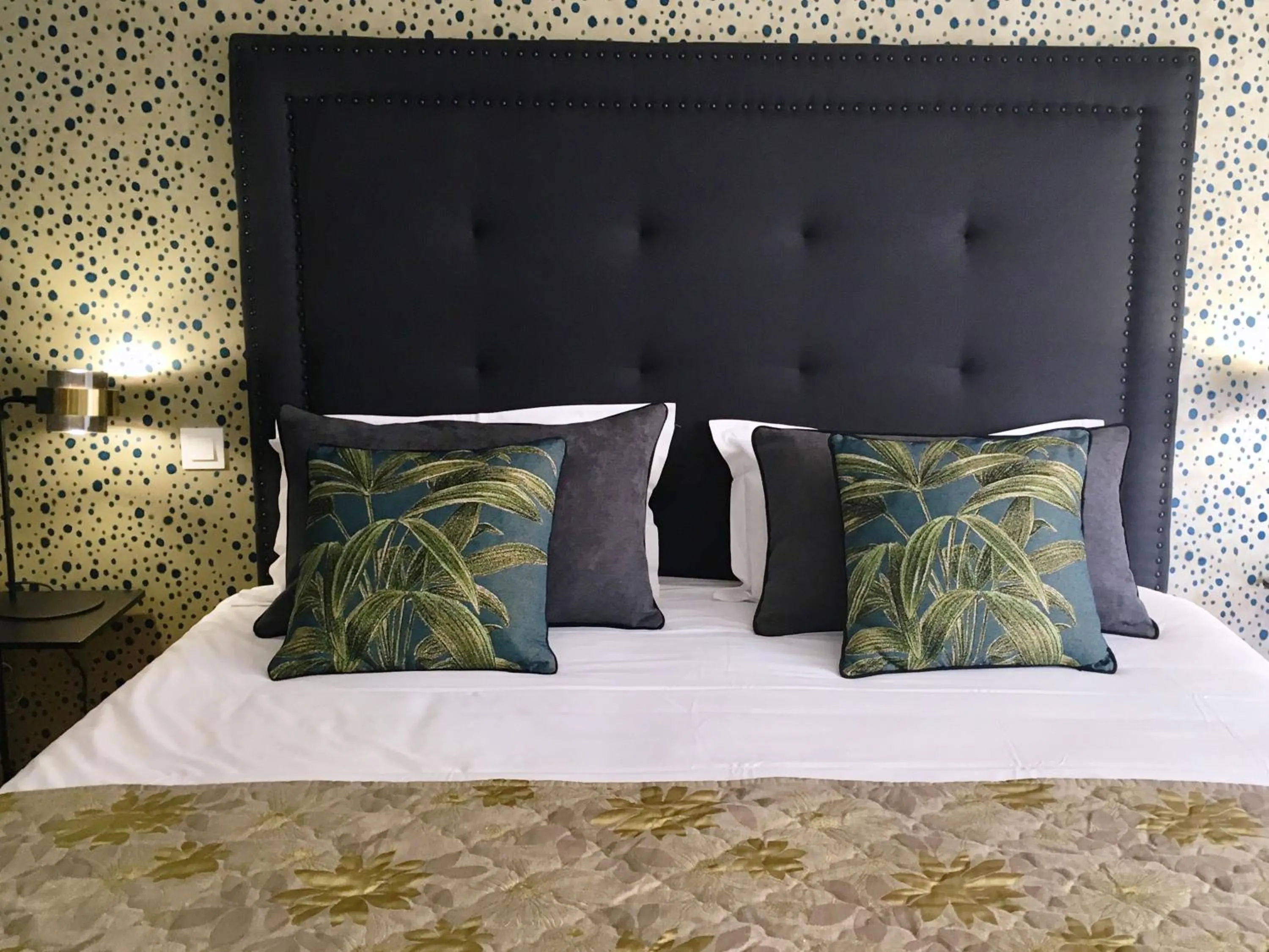 Bed in Logis Hotel Diana