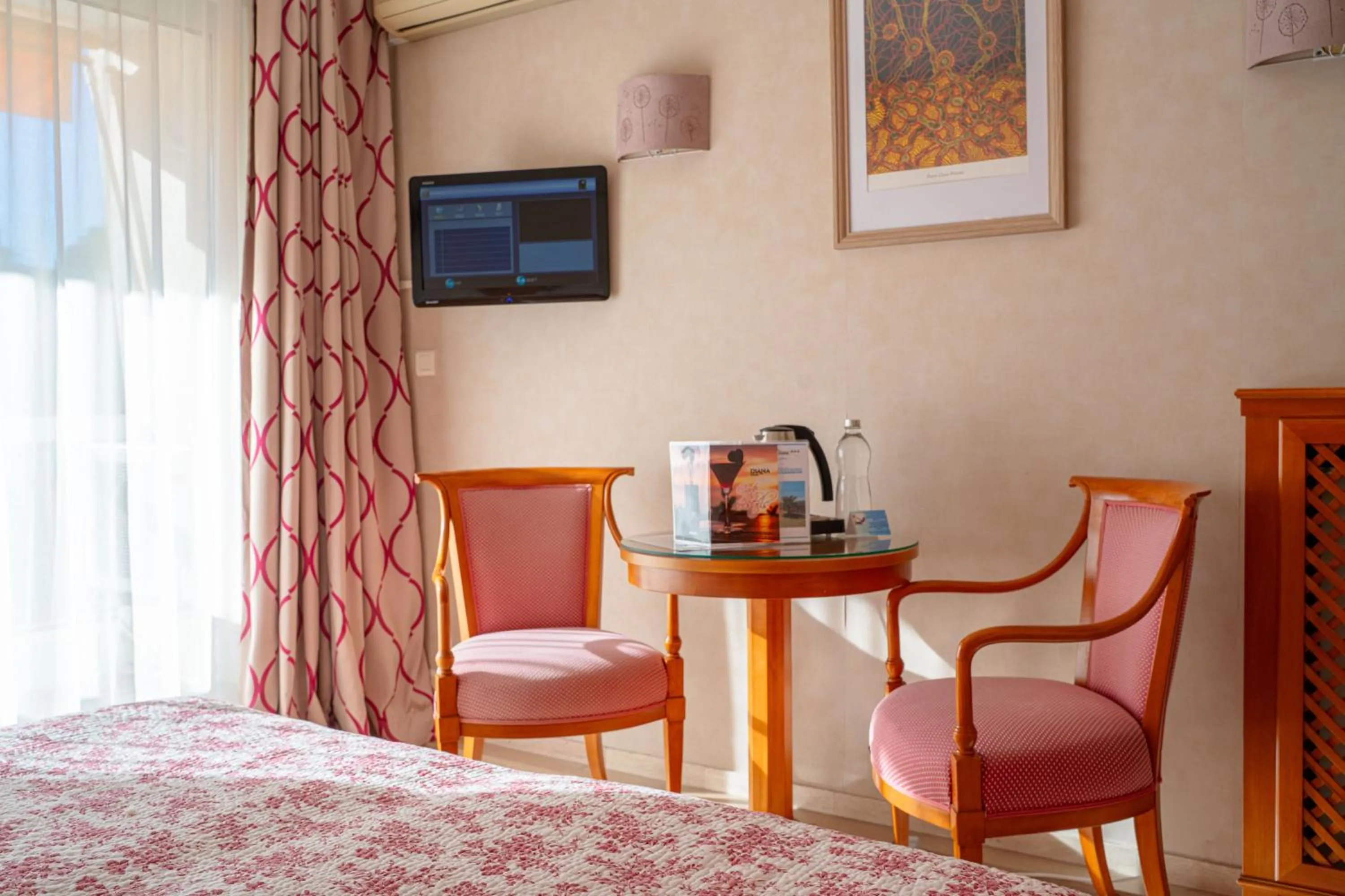 Bed in Logis Hotel Diana