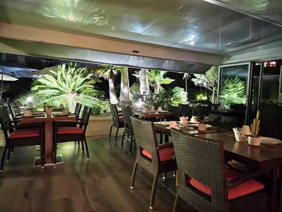 Garden view in Logis Hotel Diana