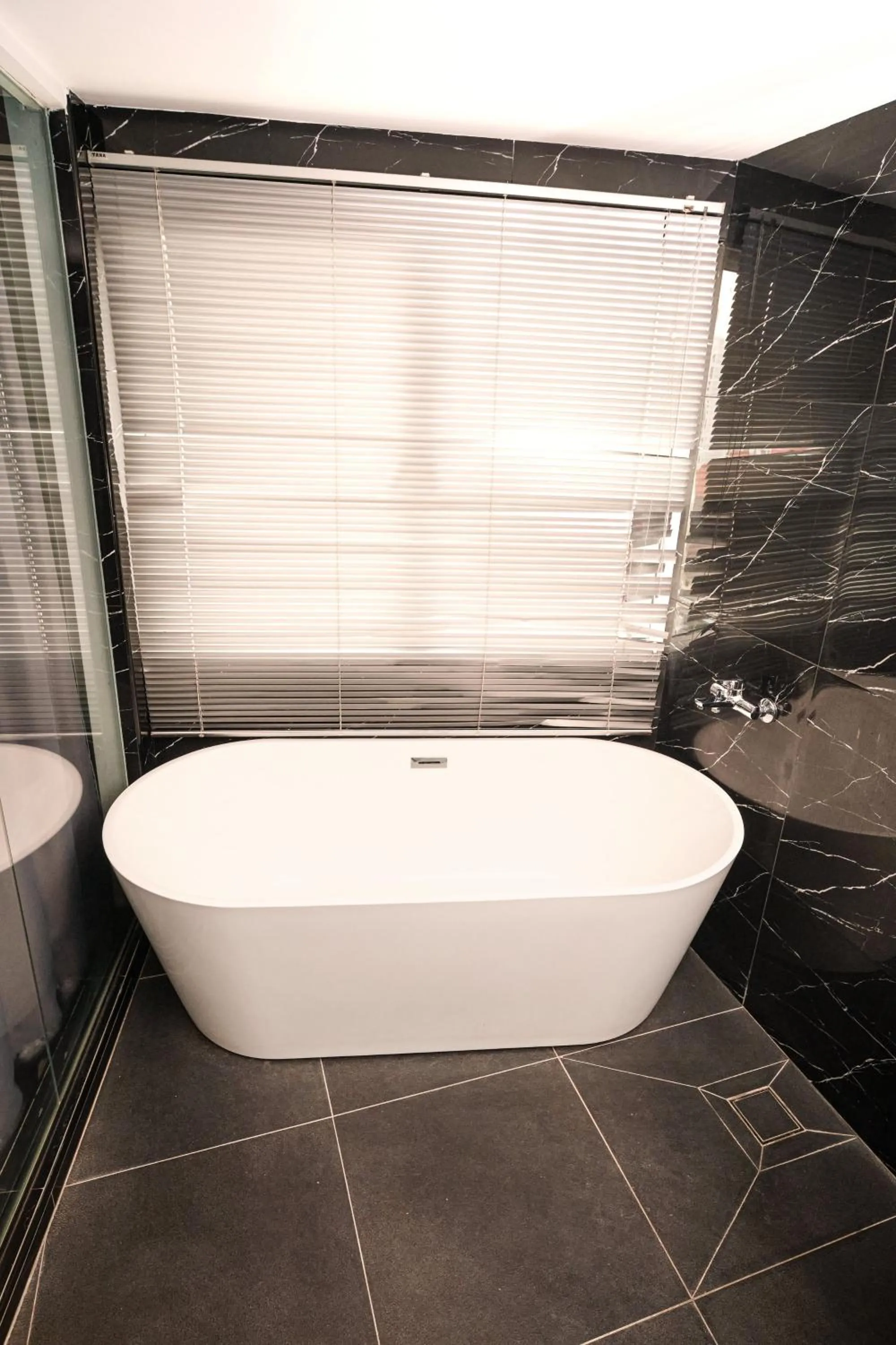 Bathroom in Palette Georgetown Formerly WoW Hotel