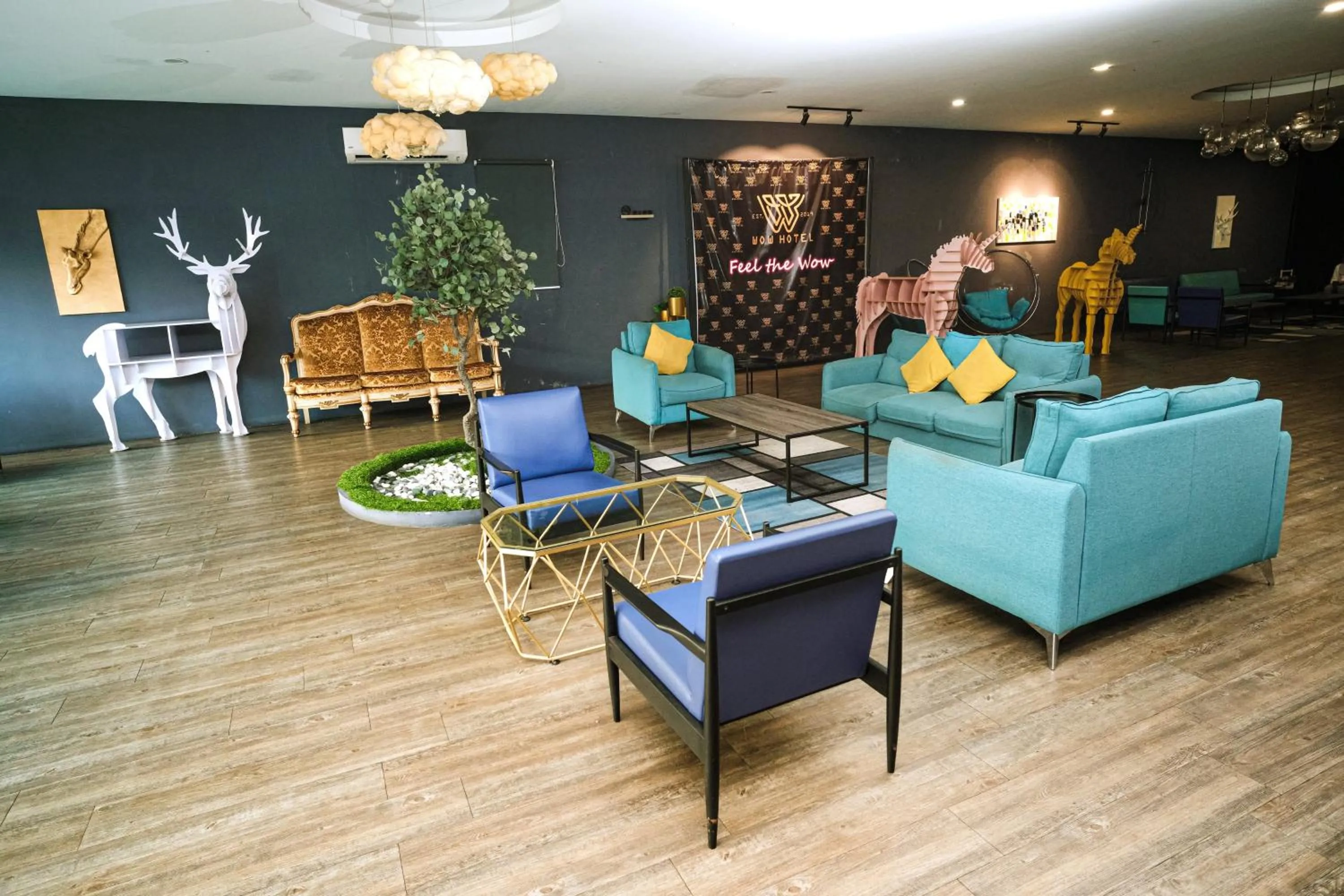 Seating area in Palette Georgetown Formerly WoW Hotel