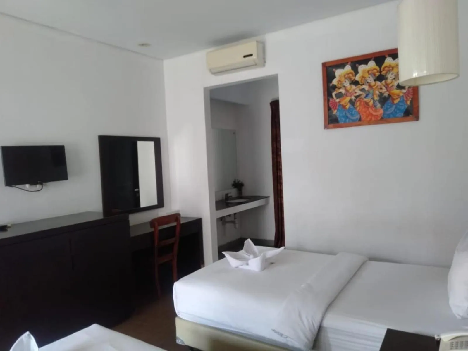 Bed in Hotel Ompu Herti