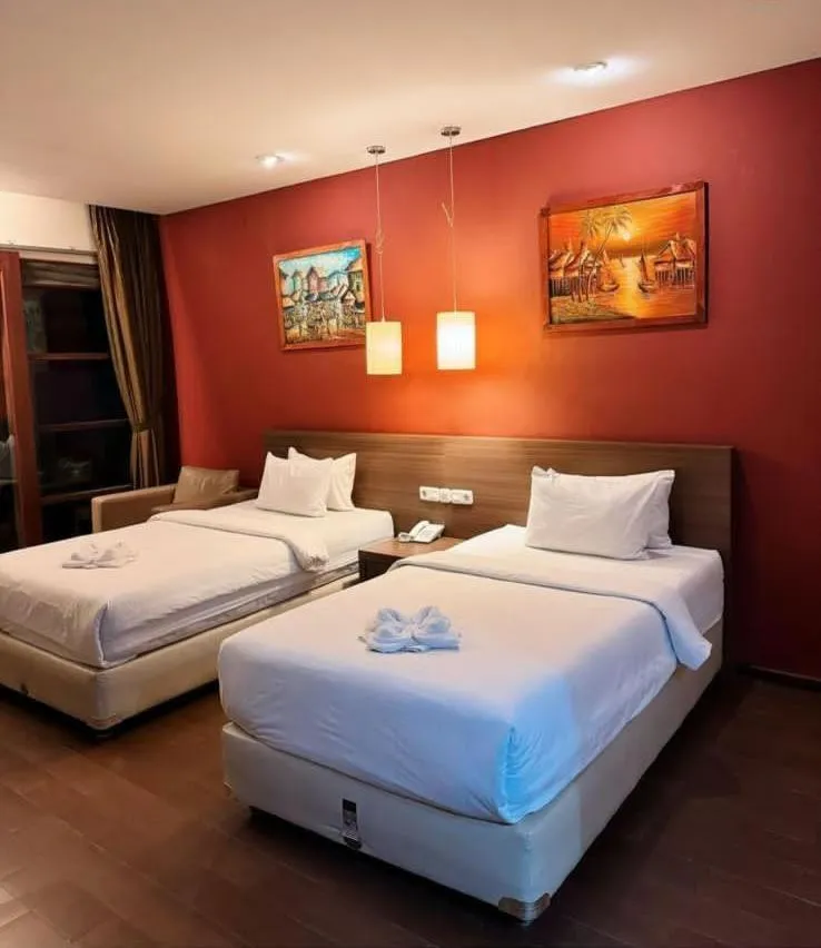 Bed in Hotel Ompu Herti