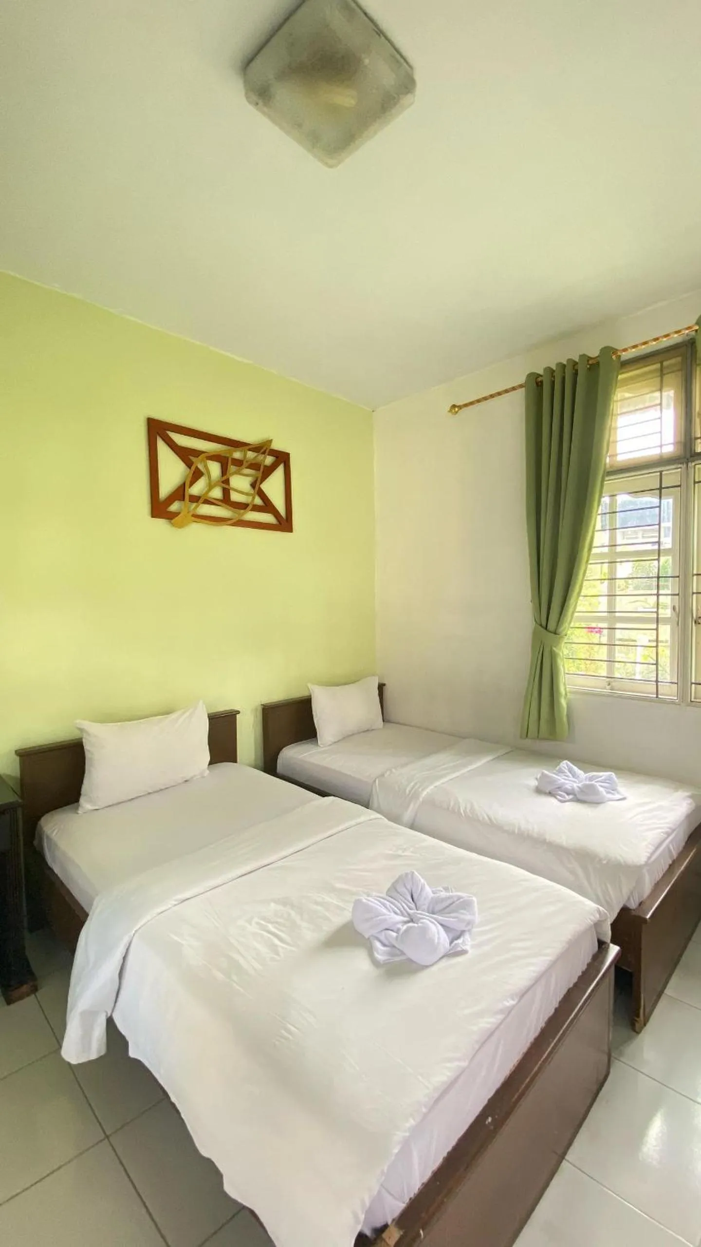 Bed in Hotel Ompu Herti