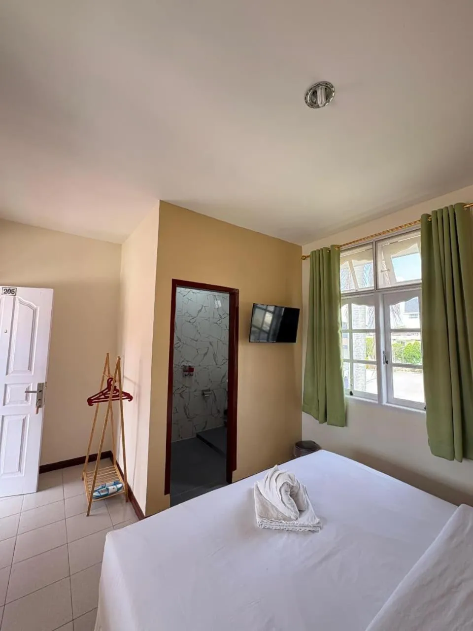 Bed in Hotel Ompu Herti