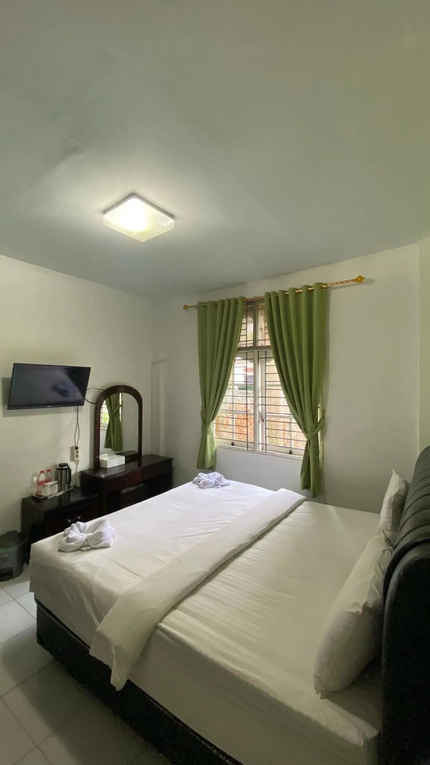 Bed in Hotel Ompu Herti