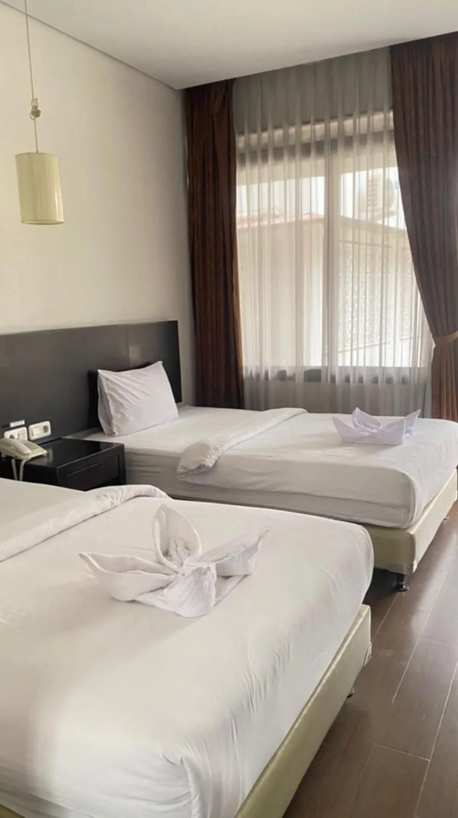 Bed in Hotel Ompu Herti