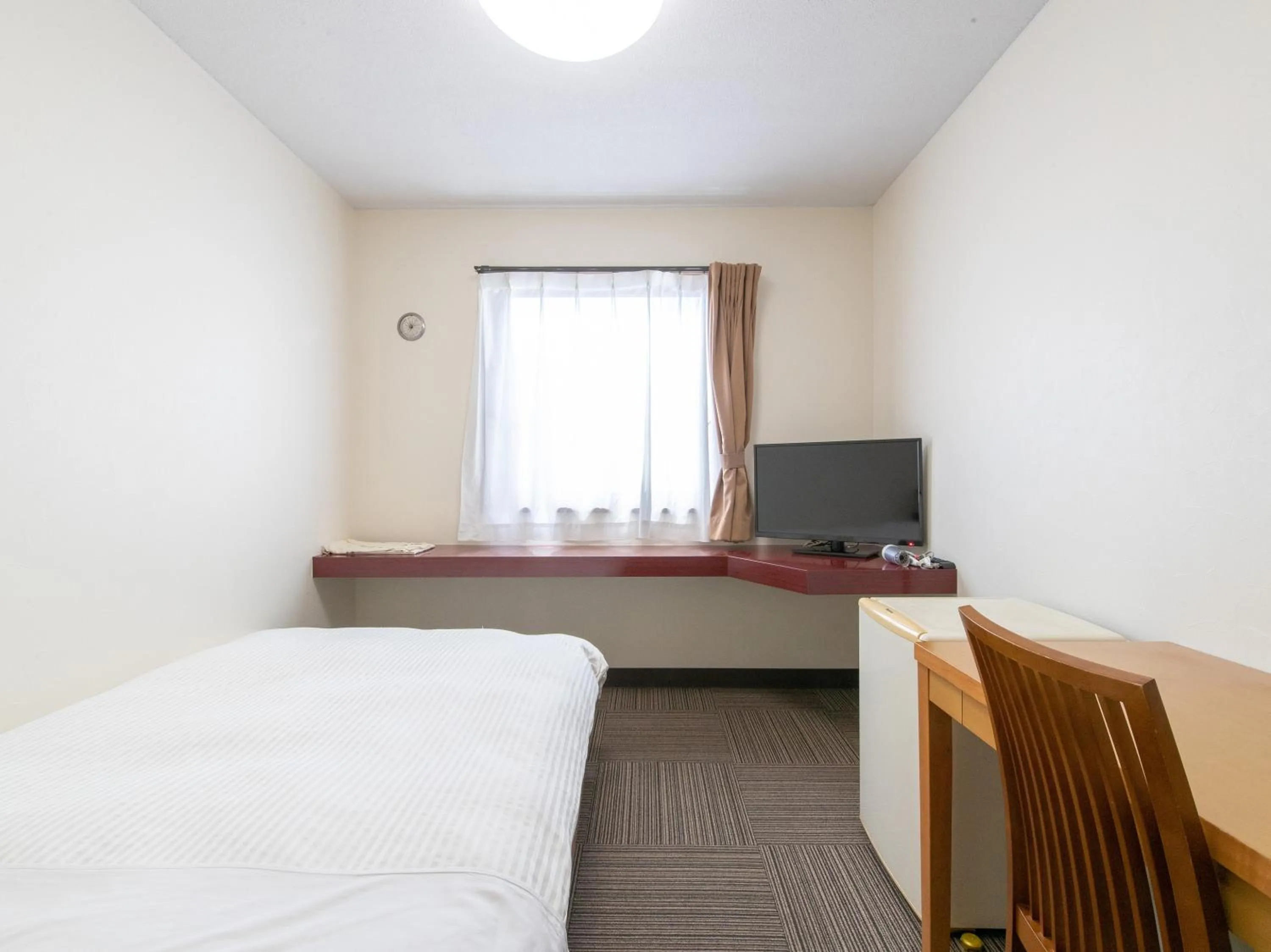 Photo of the whole room, Bed in Tabist Rays Hotel Suisen