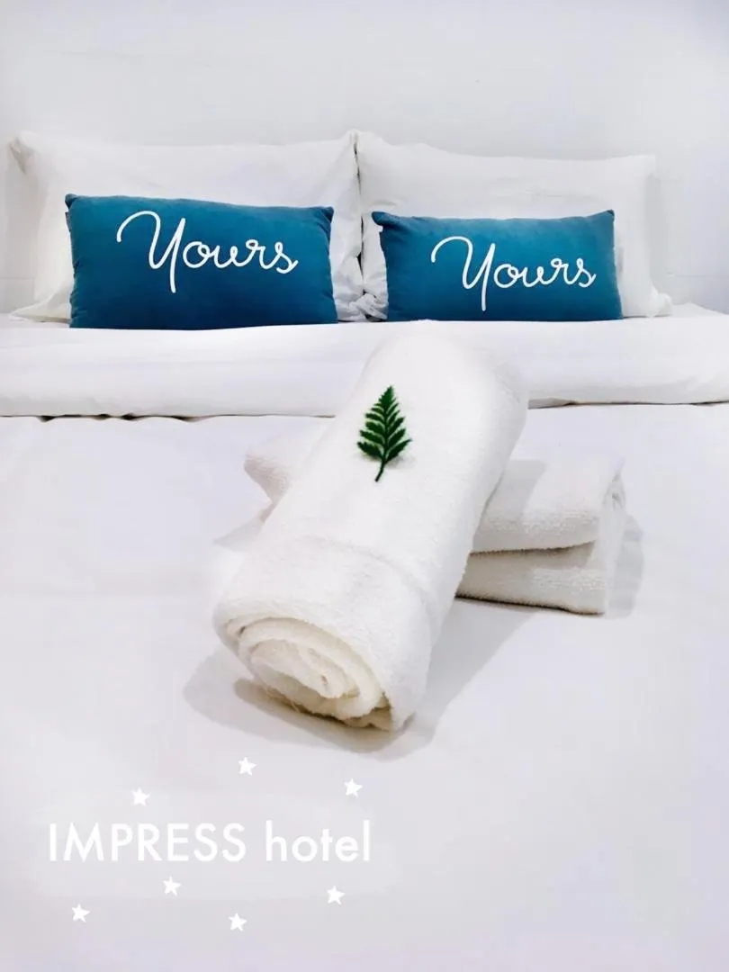 IMPRESS HOTEL