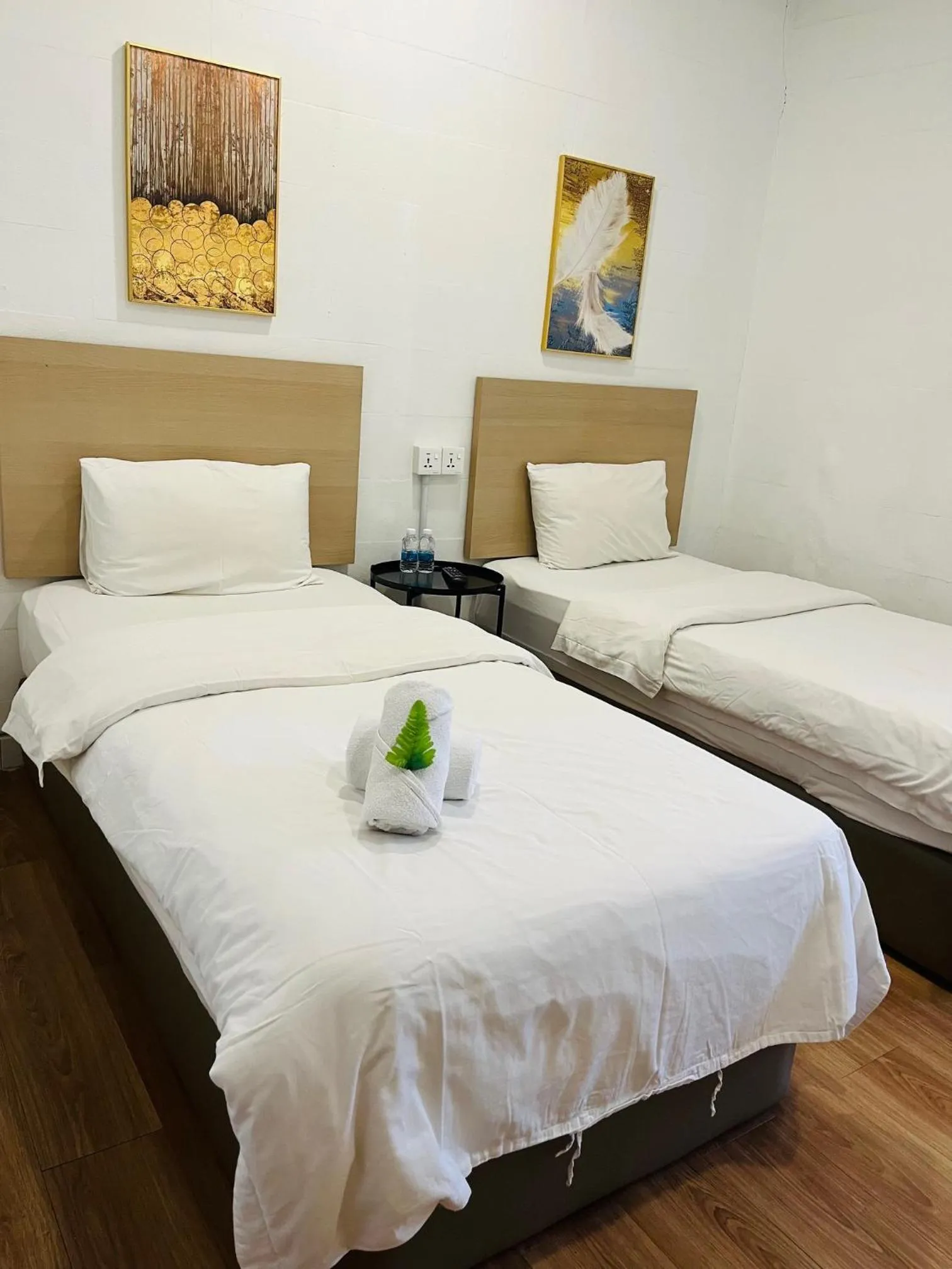 Bed in IMPRESS HOTEL