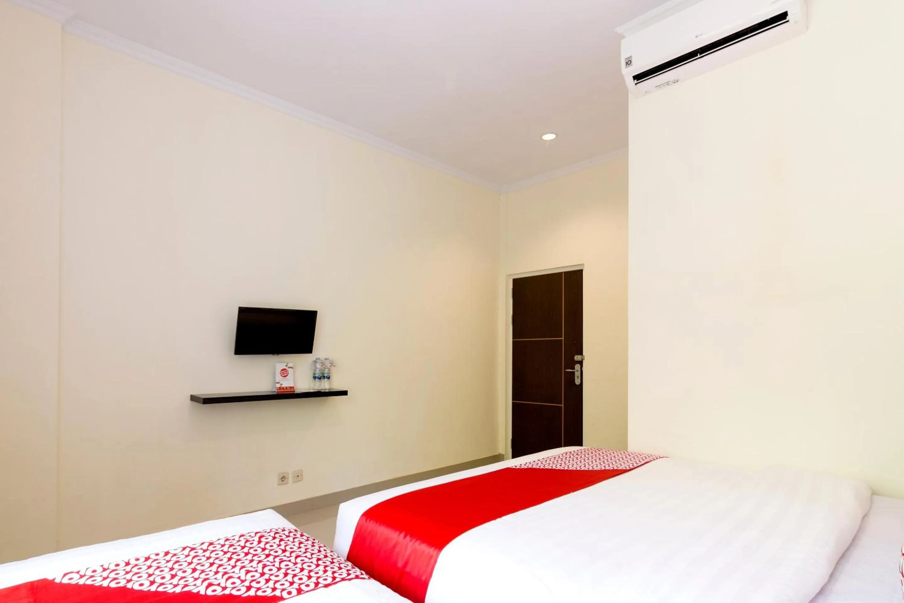 Bedroom in Hotel O Travel-inn