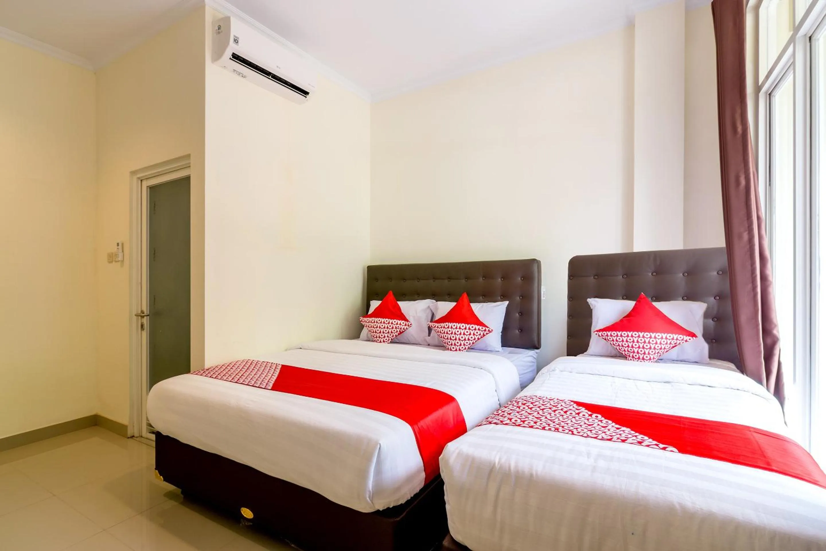 Bedroom in Hotel O Travel-inn