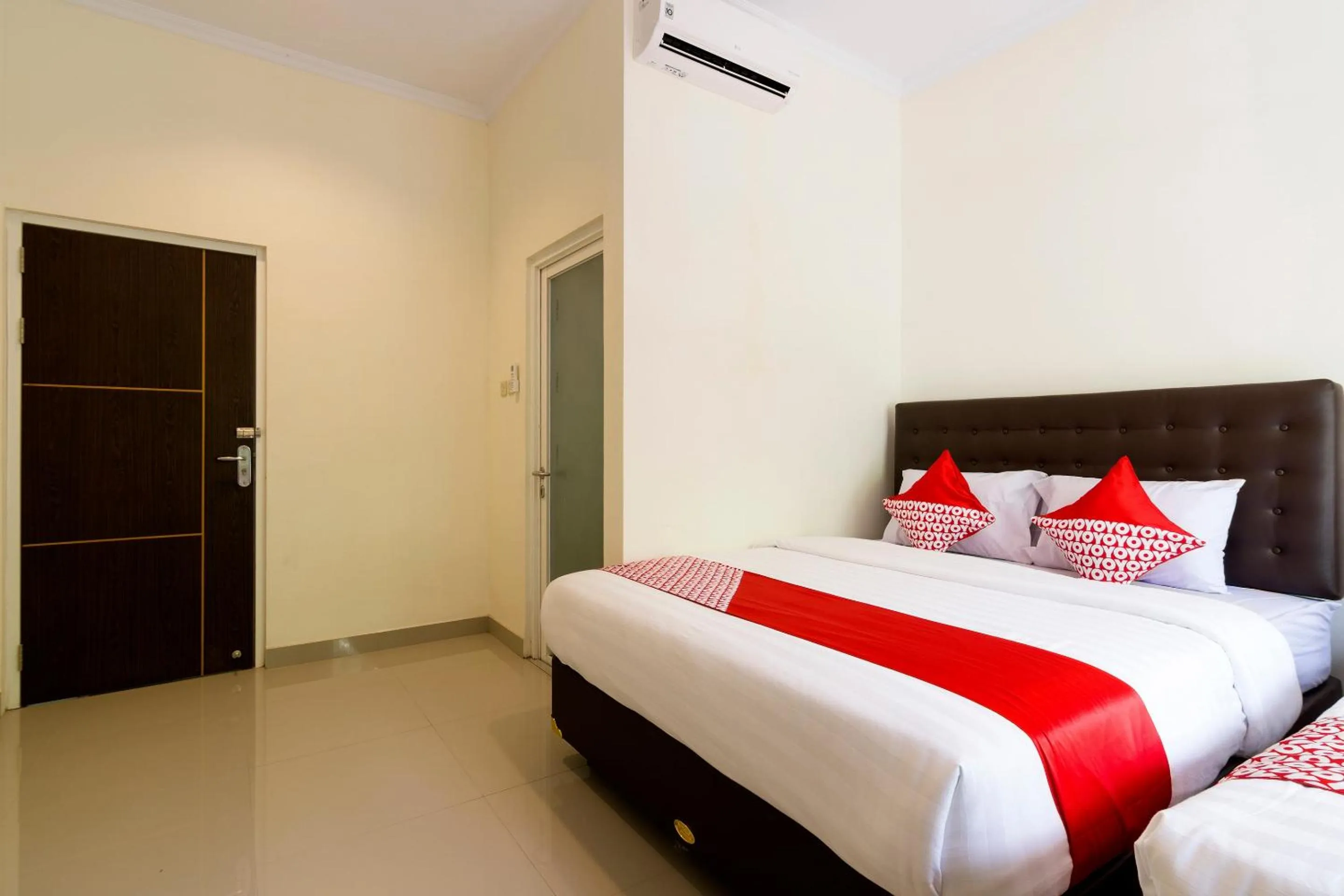 Bedroom in Hotel O Travel-inn